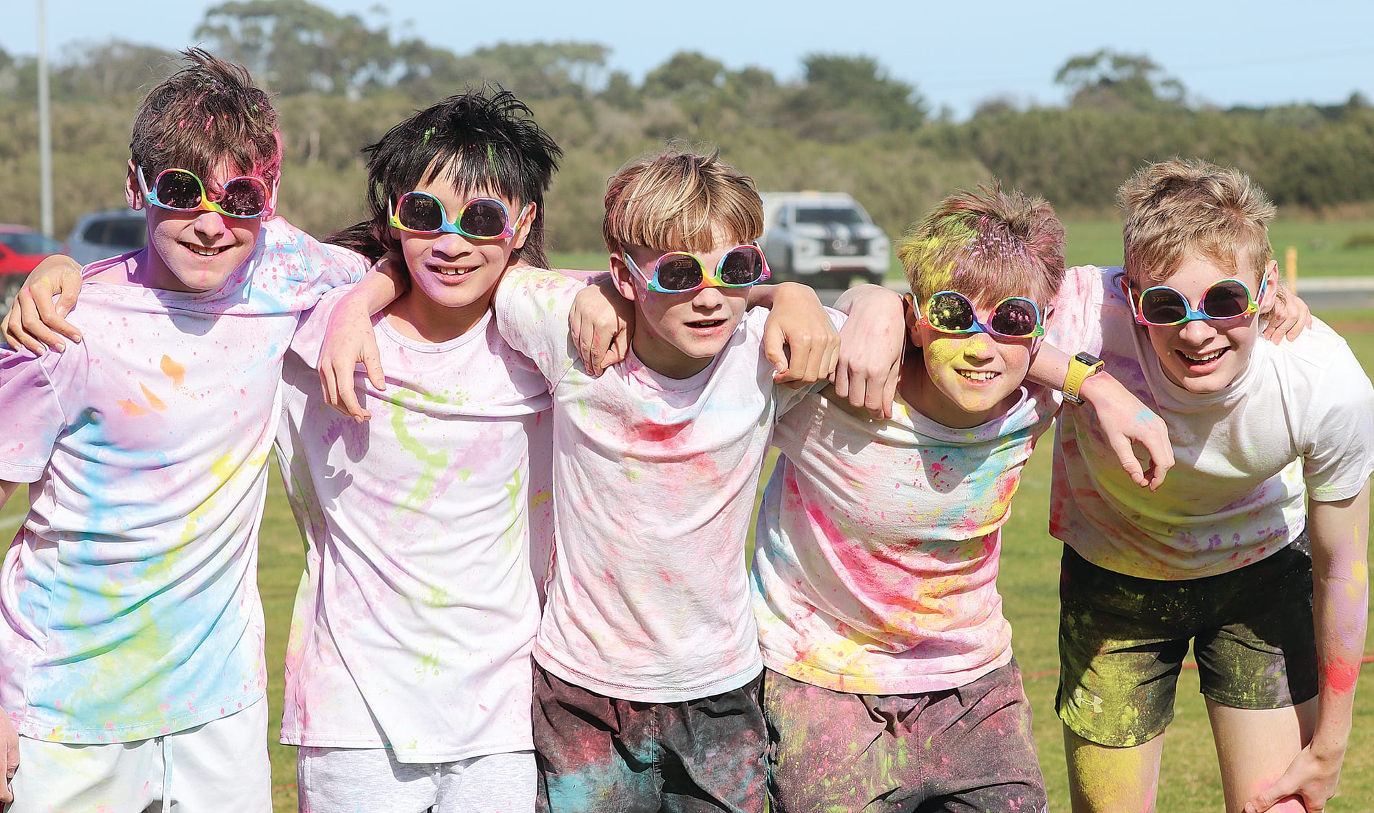 Middle school students Xavier, Rufu, Balin, Isaac and Ty had a memorable day participating in the College Colour Run. Z18_3223