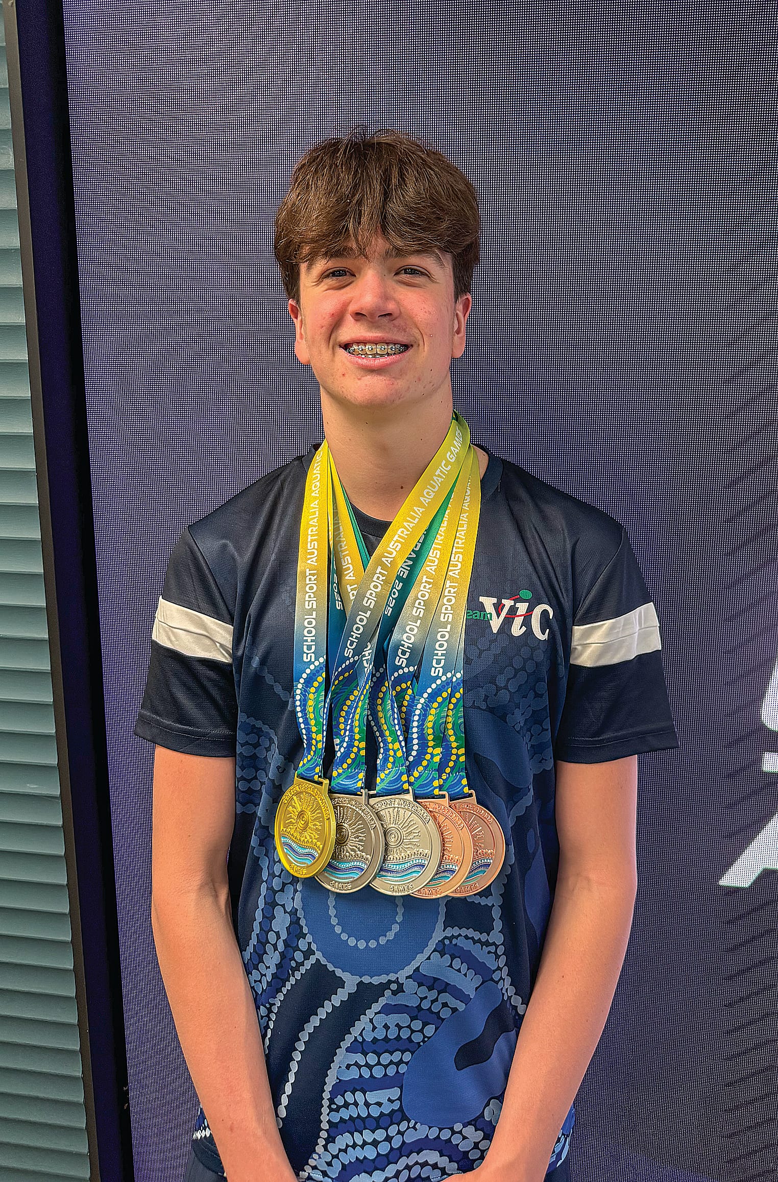 Archie came home with a collection of medals and records.