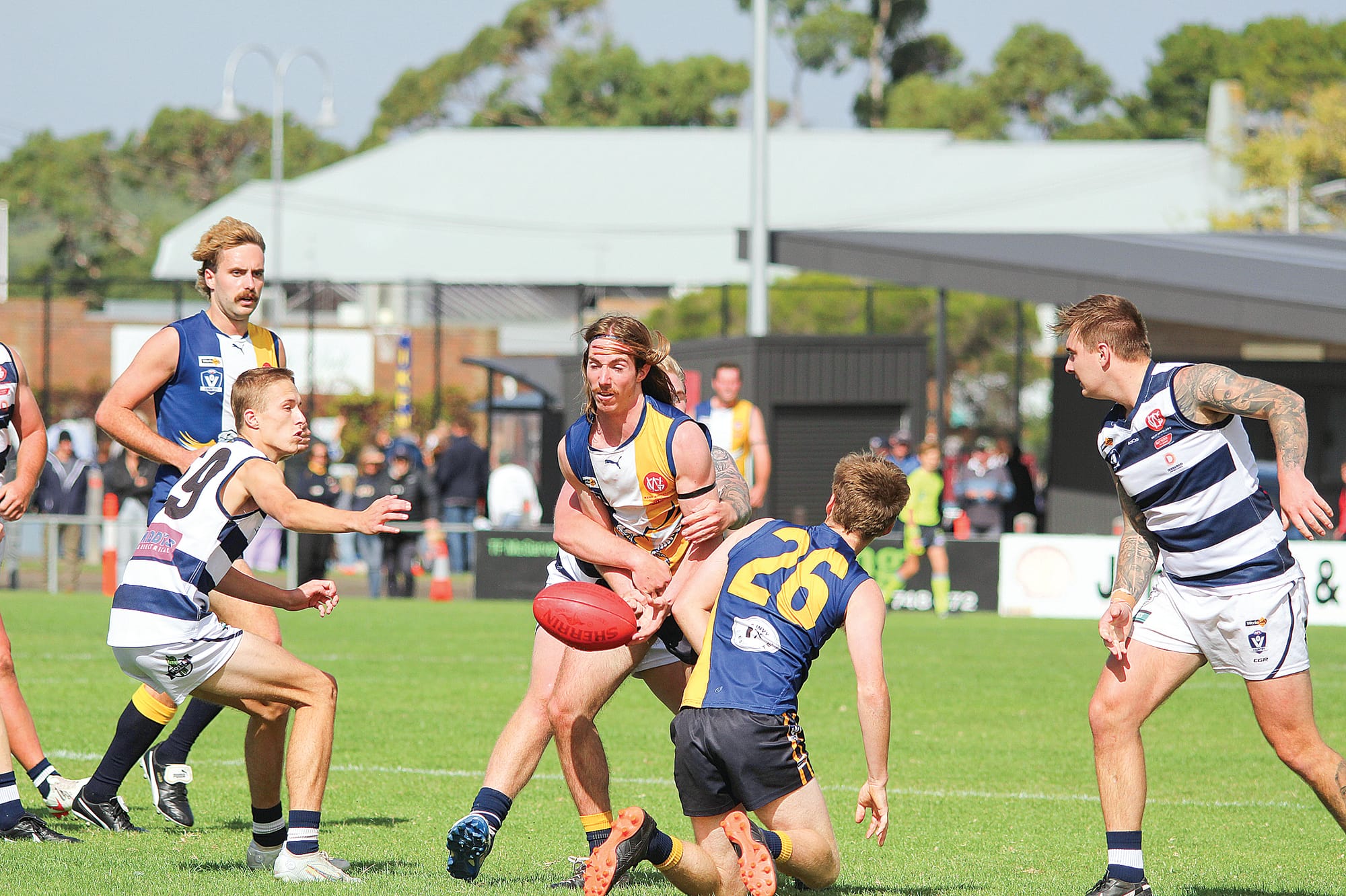 Ashton Hewitson releases the ball from a great tackle in IK’s strong win in the Reserves. 
