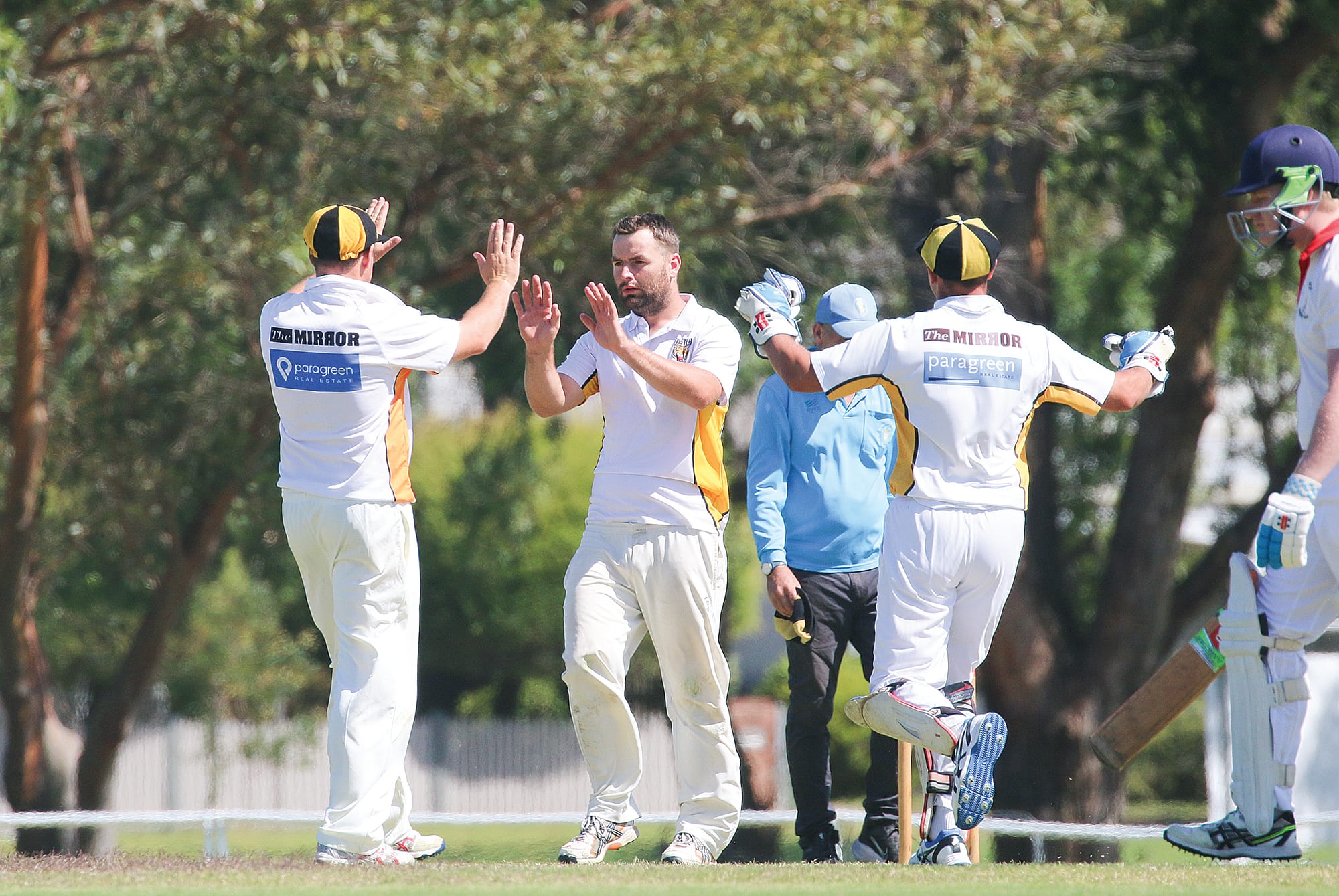 Foster celebrates a wicket taken by captain Josh Toner.