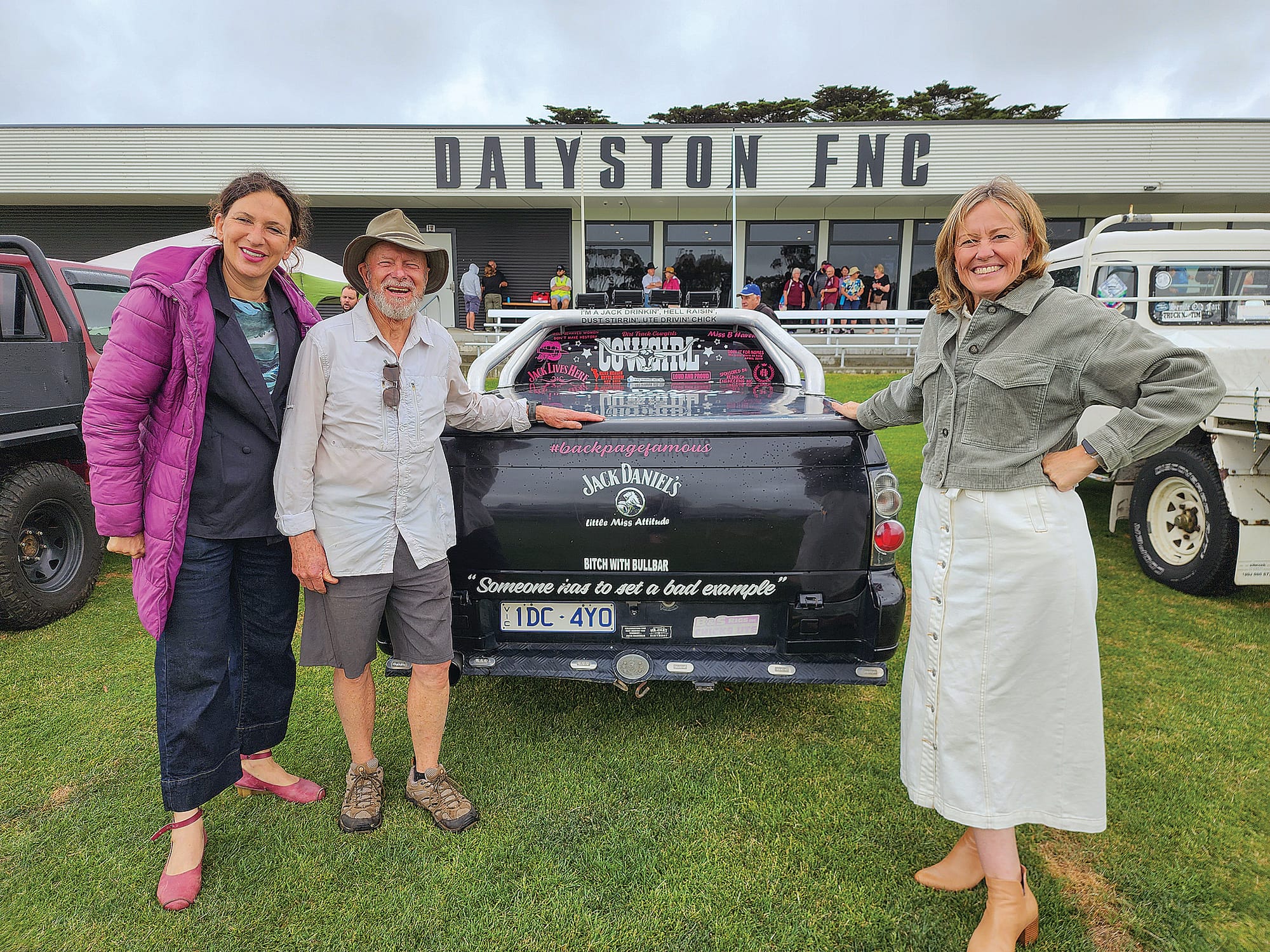 Member for Bass Jordan Crugnale and re-elected Councillor Rochelle Halstead stand with Bass Coast Historical Automobile Club member and media advisor Brian Asbury behind the winning BNS ute. C22_4724
