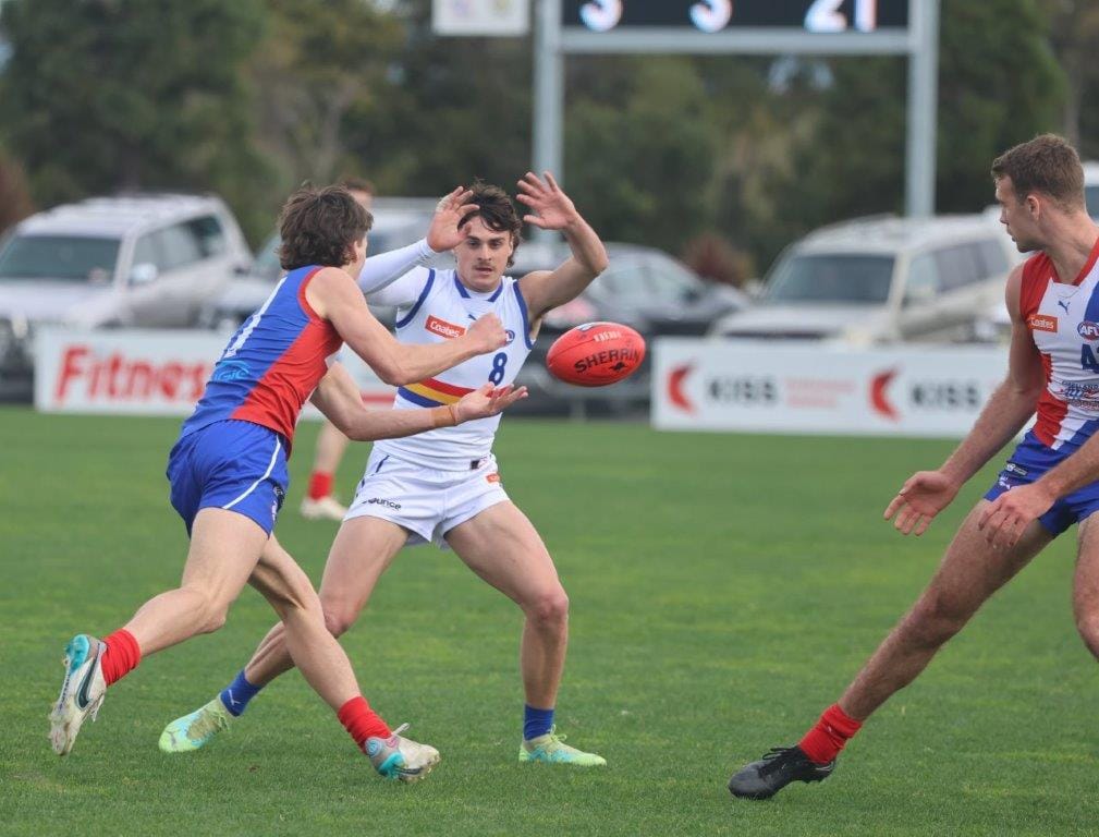 Jasper Alger gets the ball moving moving Gippsland Power's way out of the stoppage.