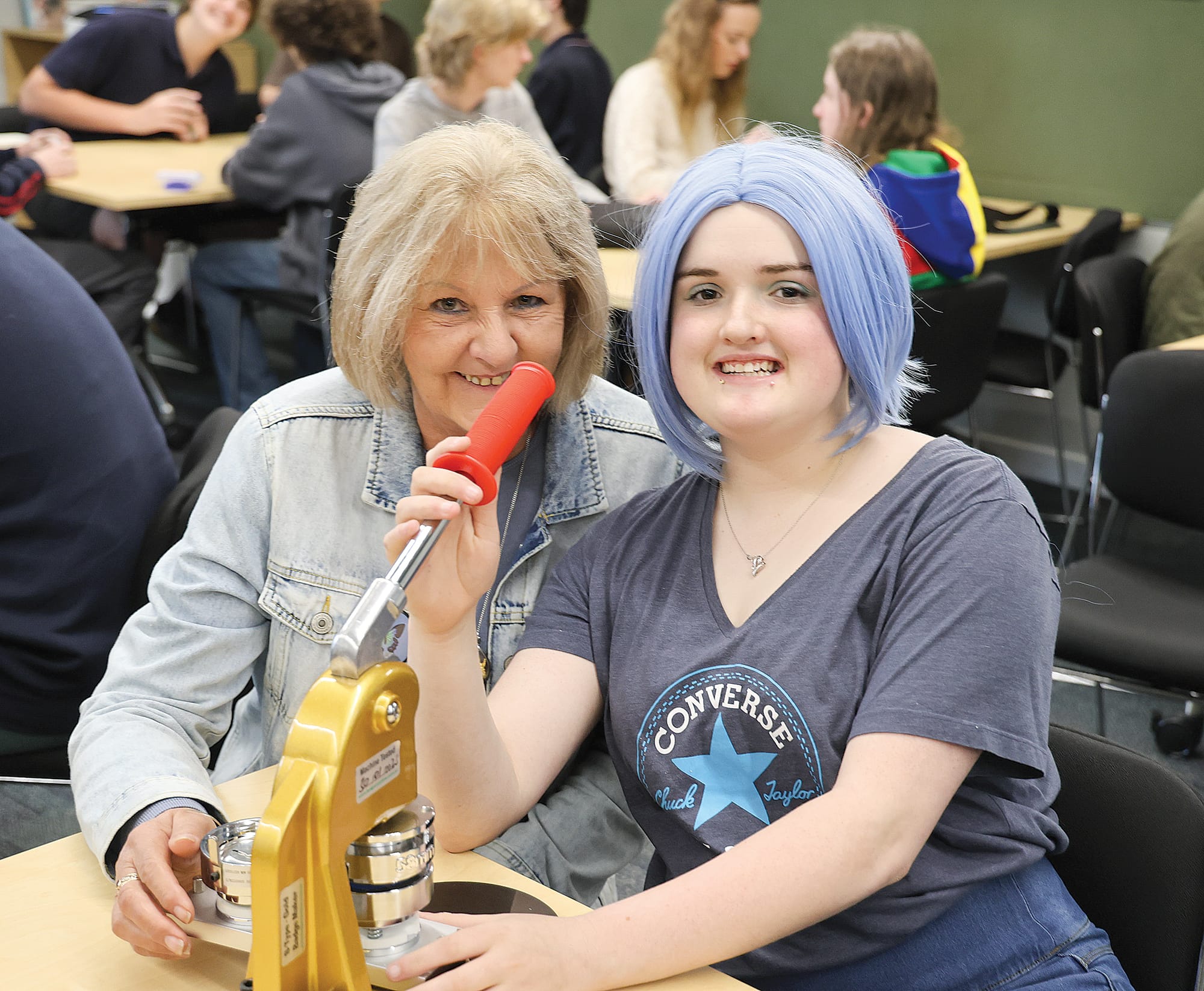 Kalahai Barnes and Wendy Ashmore make lapel badges for the anti-bullying ‘Do It For Dolly’ Day at the Bass Coast Secondary College last Friday, May 10.