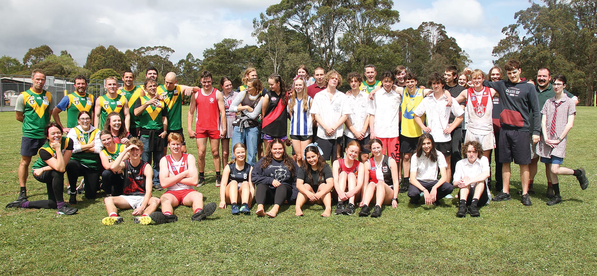 All friends after Foster Secondary College teachers score their sixth win in a row against the Year 12 students. B34_4424