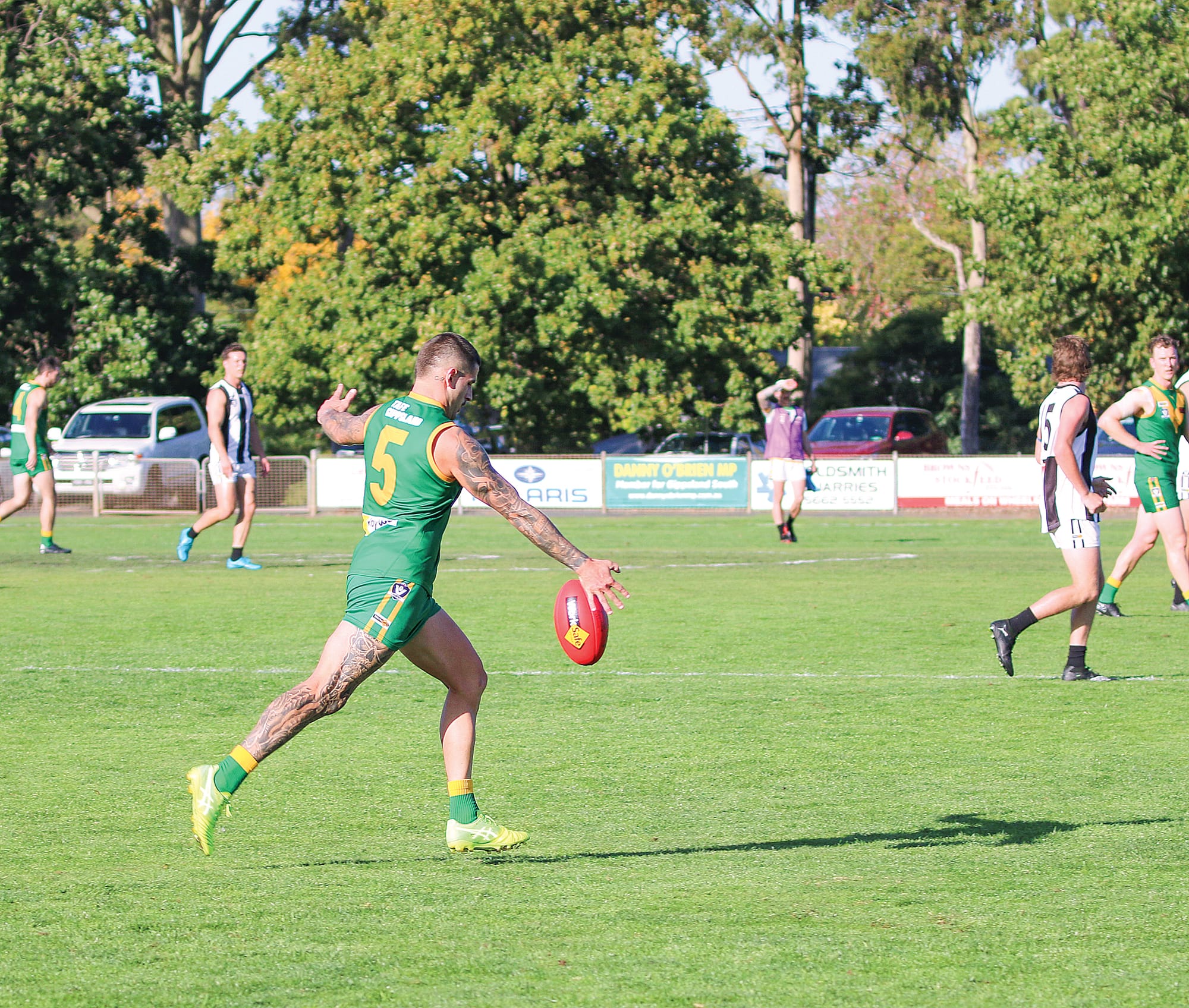 Tallin Brill kicks it down to the goal end.