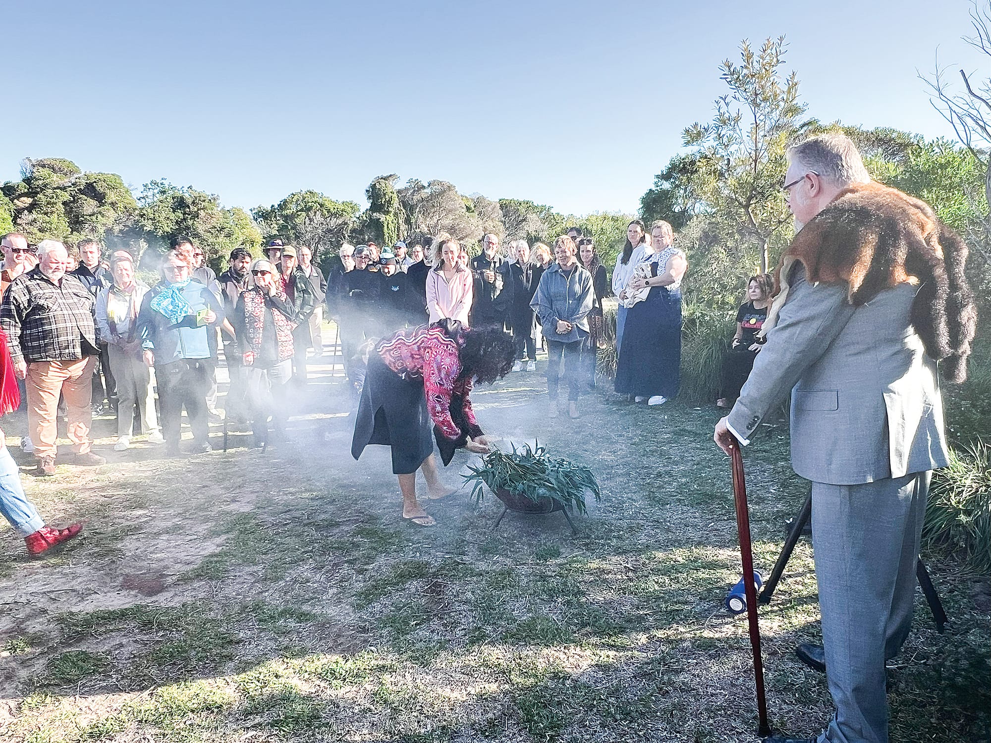 Community at a smoking for Sorry Day 2025.