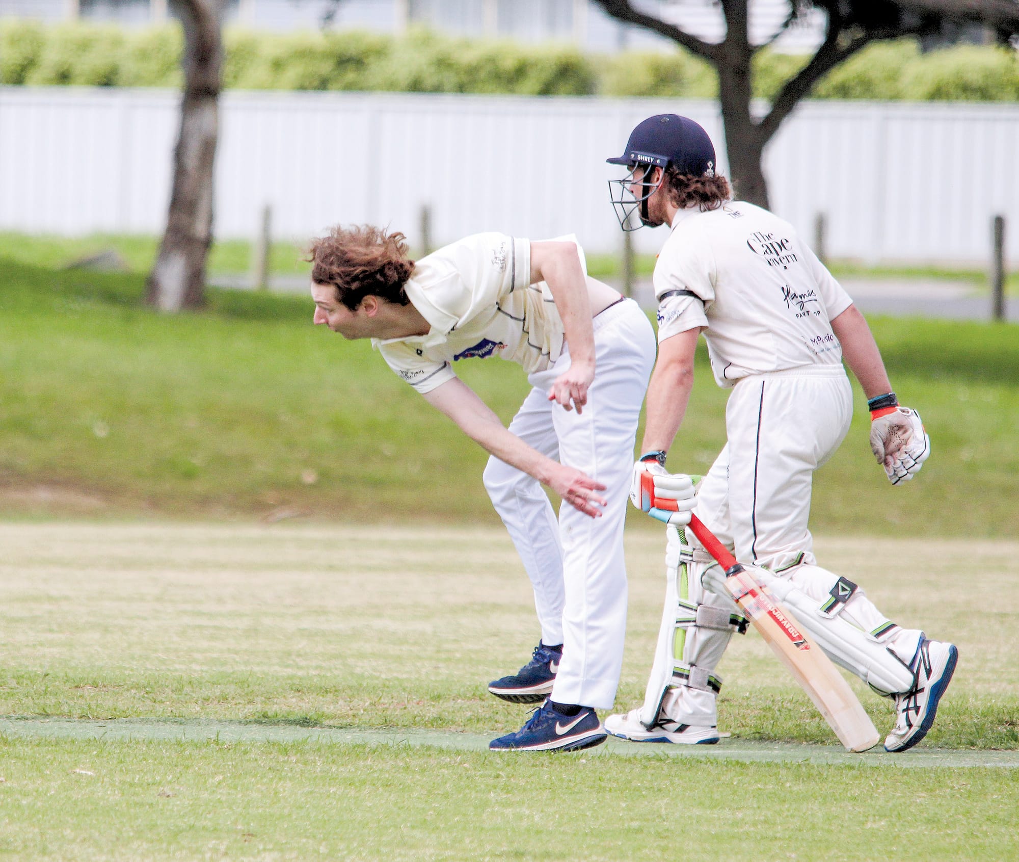 Shark Nicholas McCallum watches his delivery sail down the pitch.