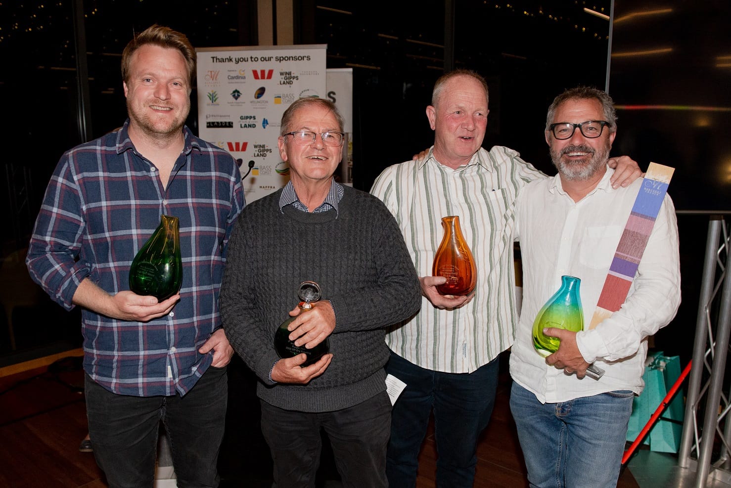 Winners of the major trophies of the 2022 Westpac Gippsland Wine Show: Rob Lightfoot (Lightfoot Wines) who won Most Successful Exhibitor, Rick Lacey (Purple Hen) with Best Wine of Show, Alistair Butt (Lightfoot Wines) and Marcus Satchell (Dirty Three Wines) who won Best Red and Best White Wines of Provenance and Best Chardonnay.