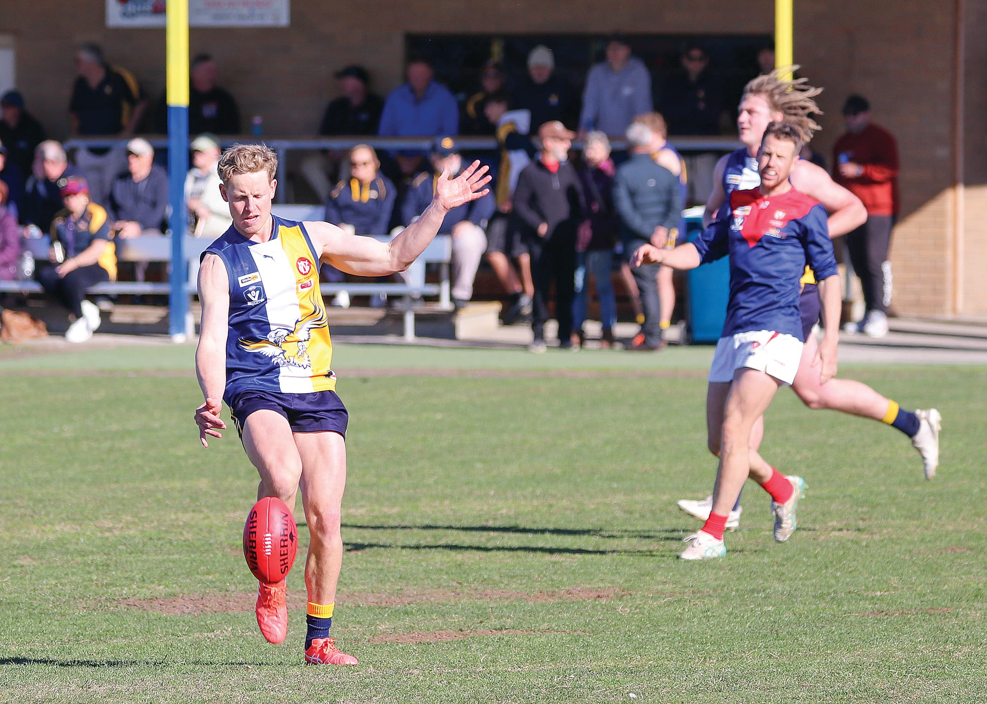 Paul Pattison with a defensive clearing kick. He also contributed two goals to Inverloch-Kongwak’s tally. W12_3225