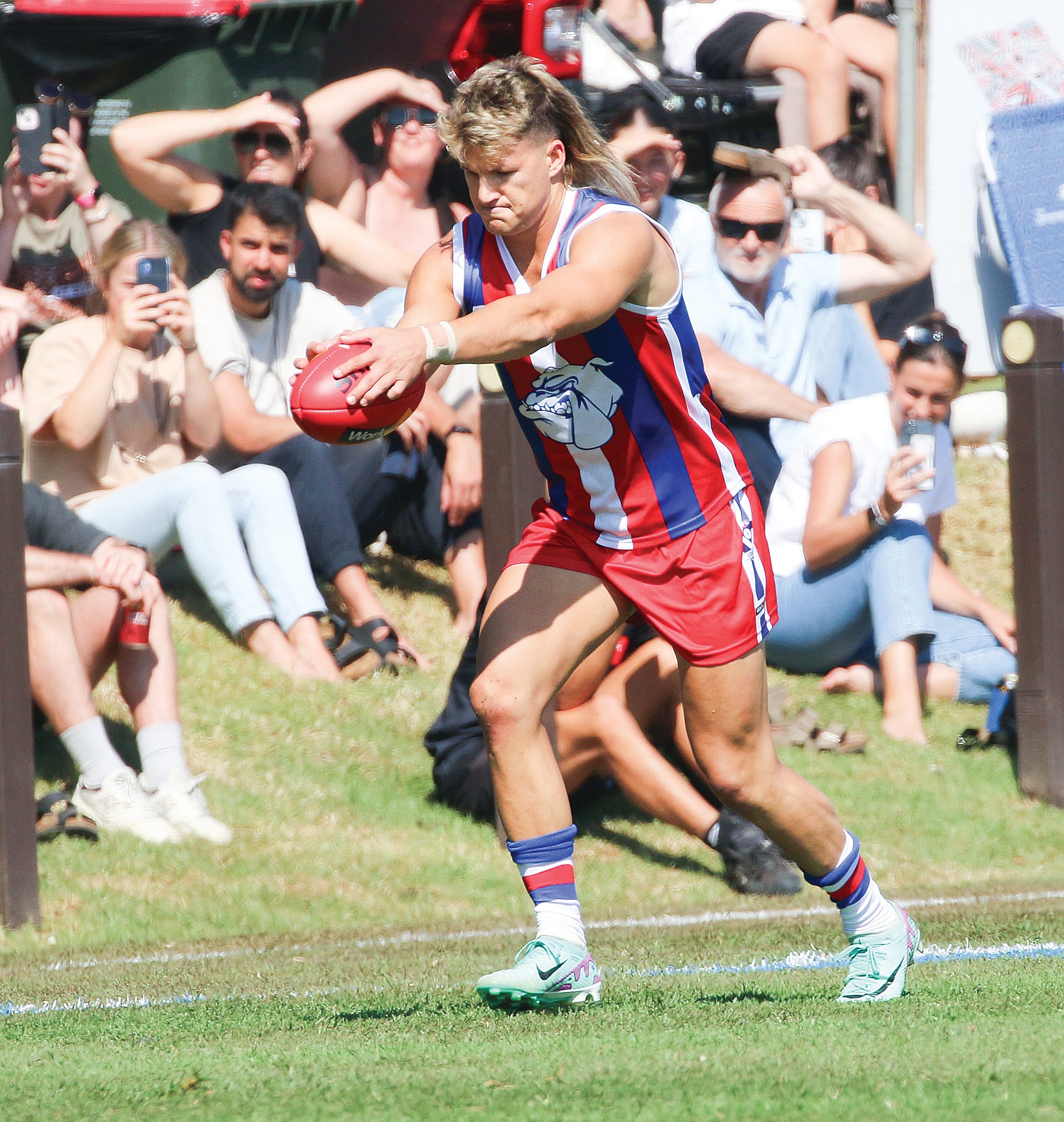 Thomas Baulch (AKA Prime Train) kicks his first of eight goals for Phillip Island.