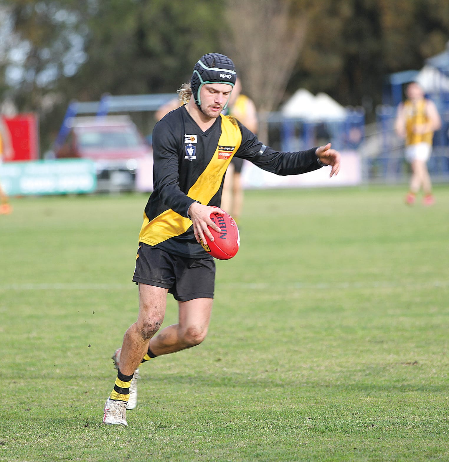 Foster’s Angus Norton takes his kick after an easy mark against Morwell East. B107_3125