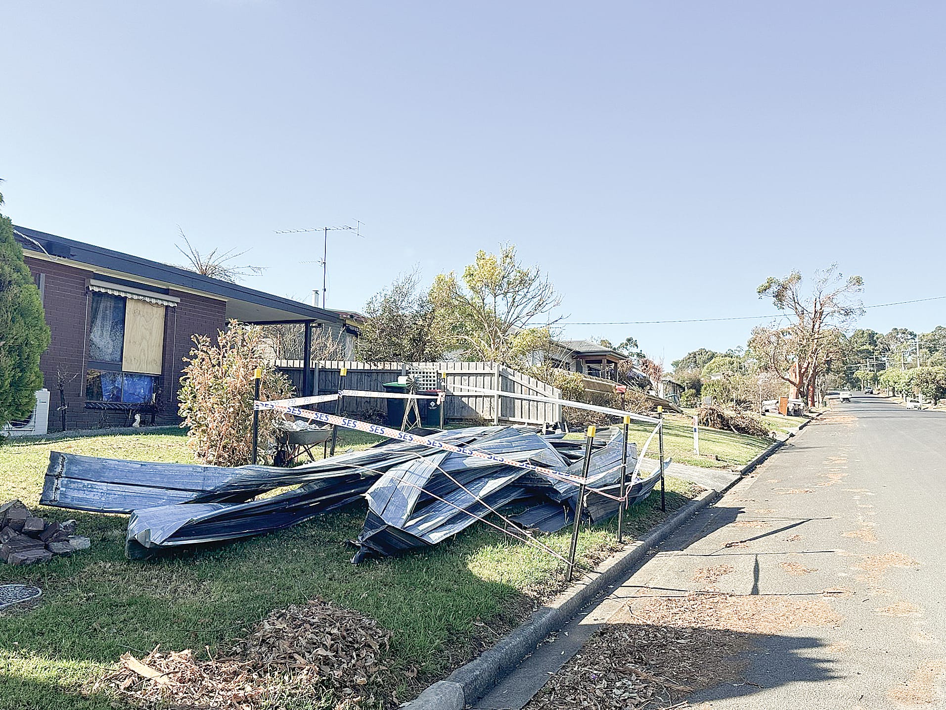 Sheets of tin, structural material, water damaged furniture and other items are ready for pick up. ob07_1024