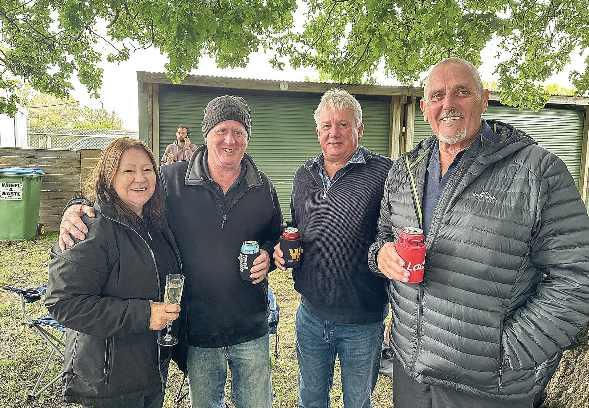 Mary and Lance Collins with Paul Daws and Jim Keely catching up over a few beers and bets at the Woolamai Races. ob05_0124