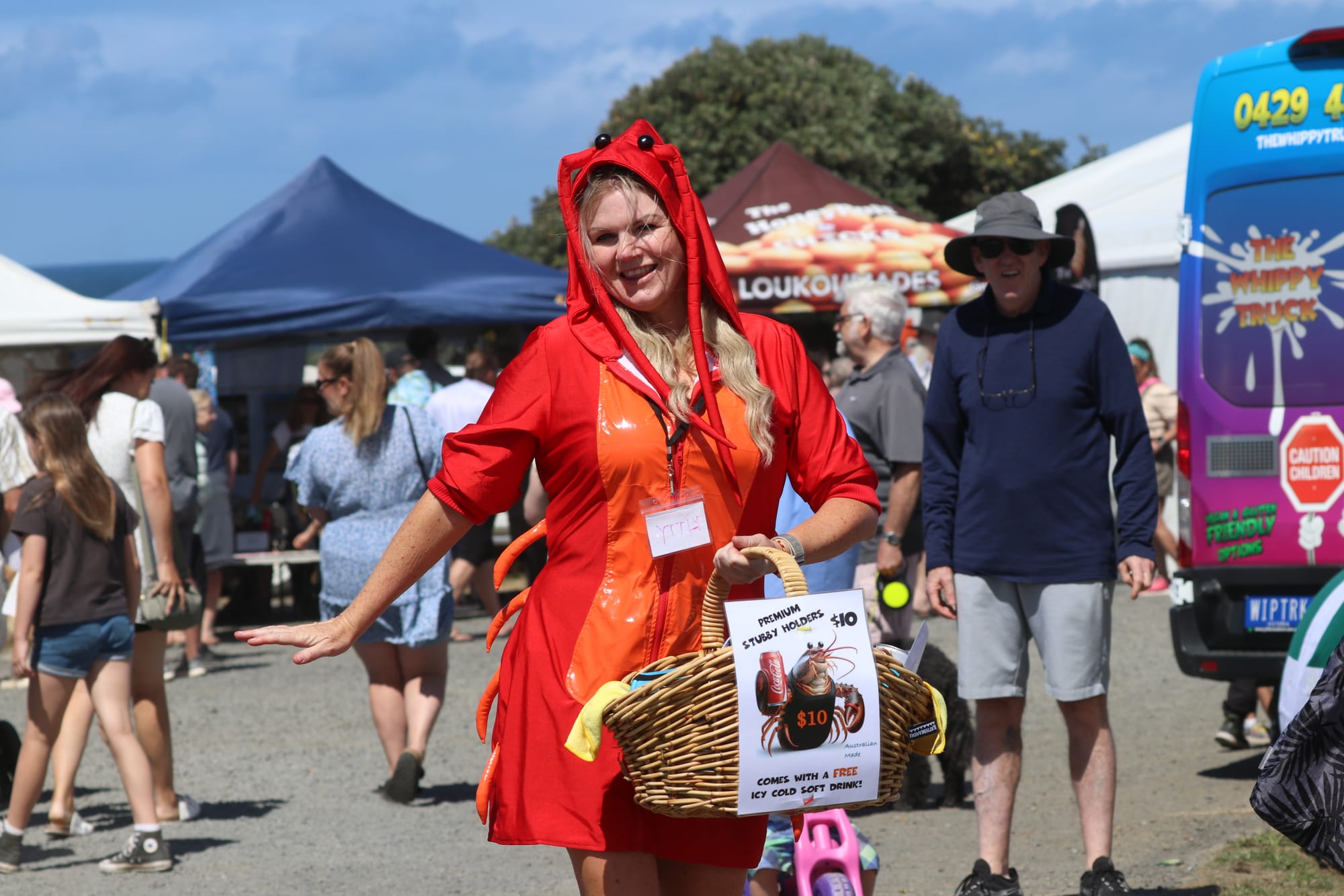 Kitty ‘The Lobster’ selling lobster festival merchandise.