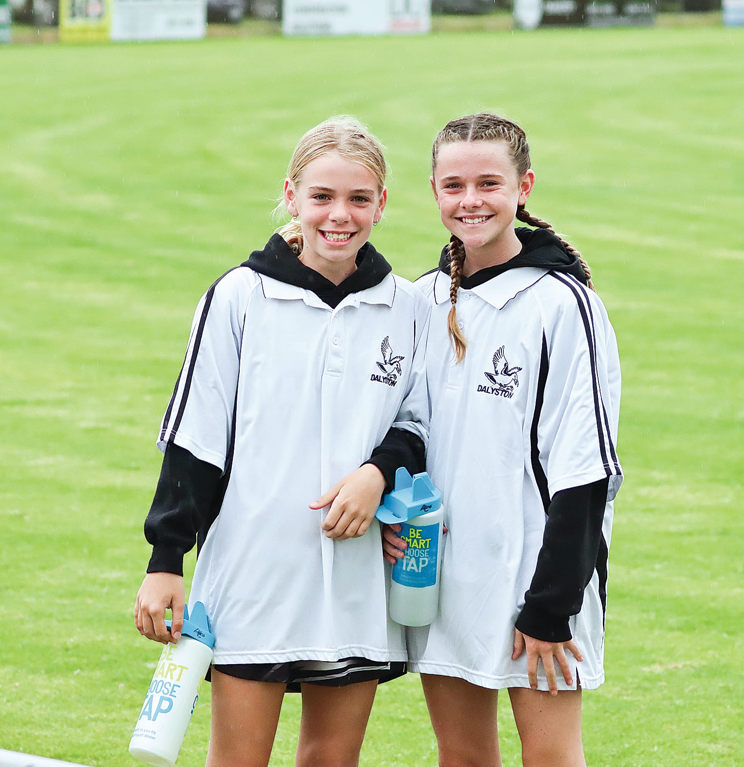 A couple of young helpers ensure Dalyston players don’t go thirsty during their Under 18 match against Koo Wee Rup.