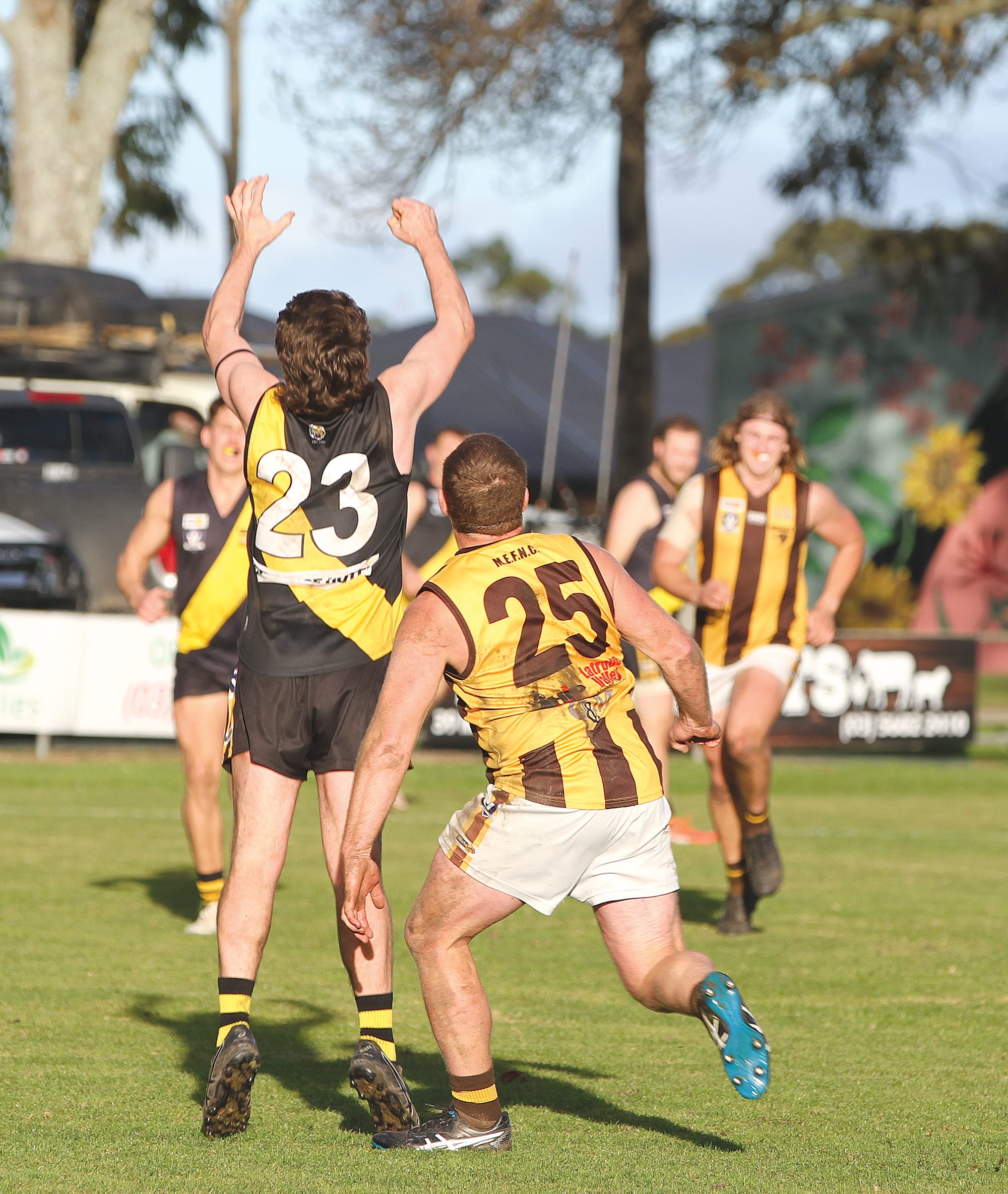 Tiger’s Jack Flavelle out-running and out-marking the hapless Hawks at Foster. B111_3125