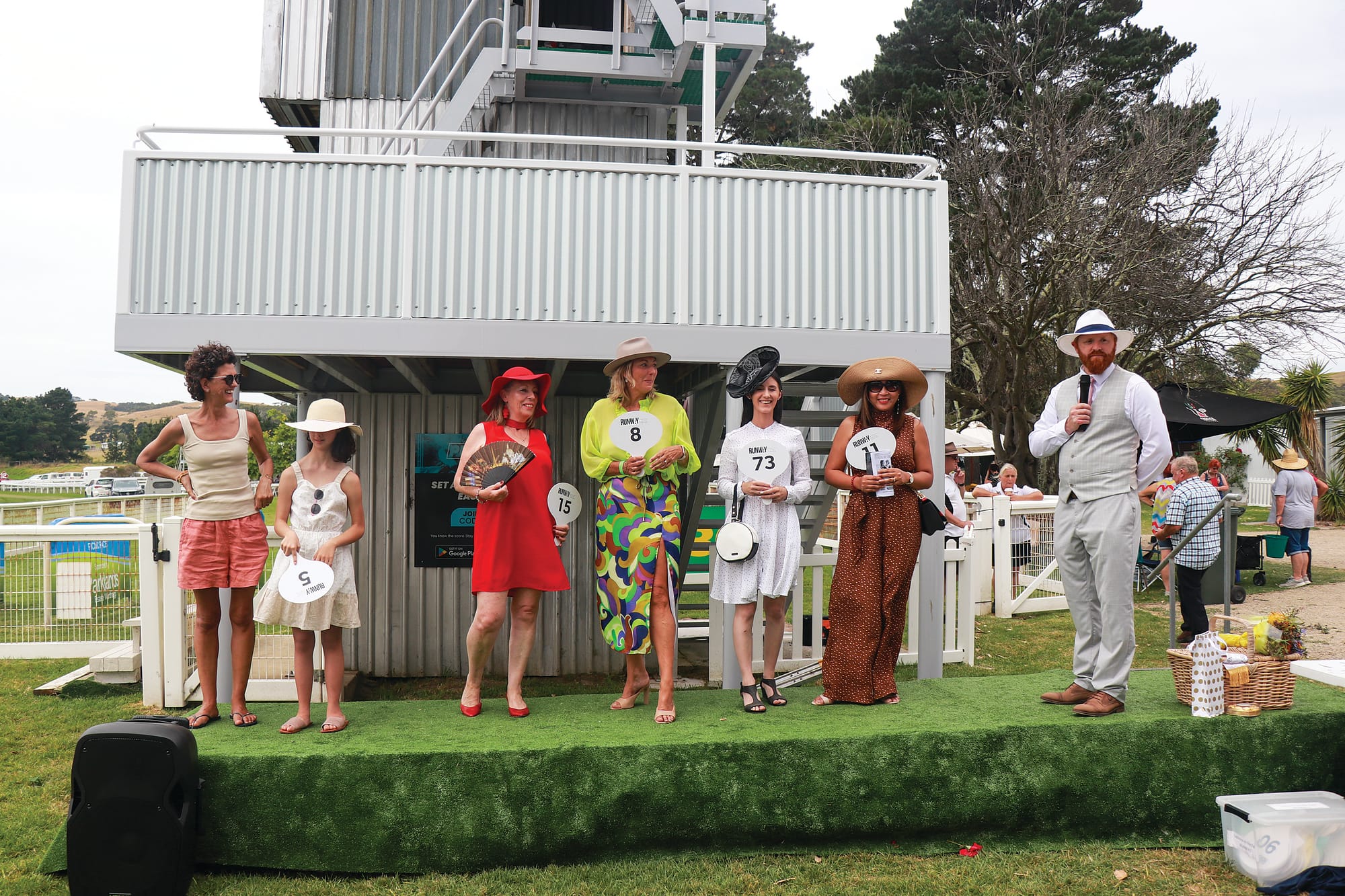 Fashions on the field managed by Eventful Horizons Wedding and Event Decorating with MC Glenn Odgers showcasing the finalists for the 2023 event. Z29_0523 