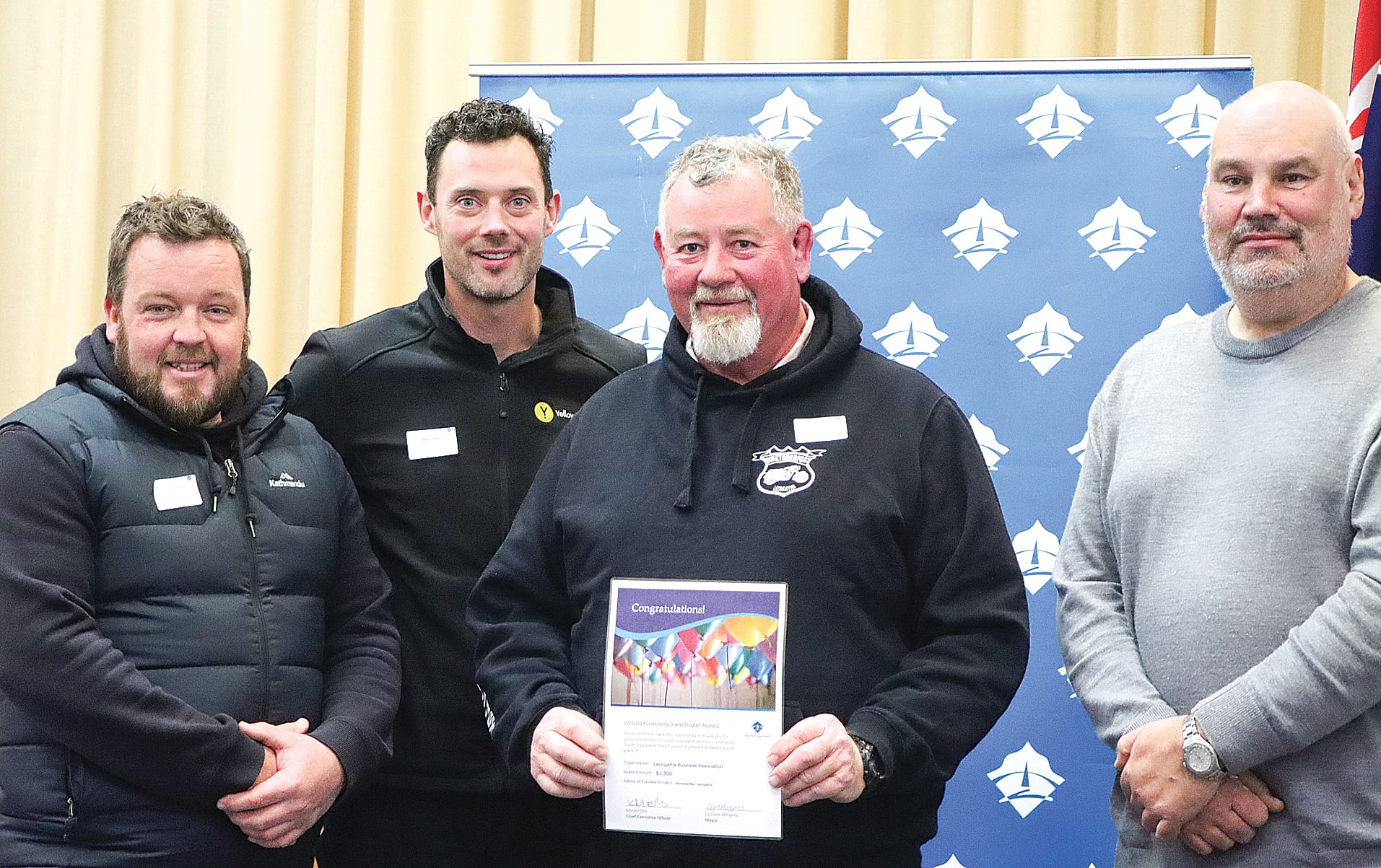 Scott Cameron, Marty Reidy and John Burke of the Leongatha Business Association get $3500 towards Biketoberfest, with Cr Scott Rae. A17_3124