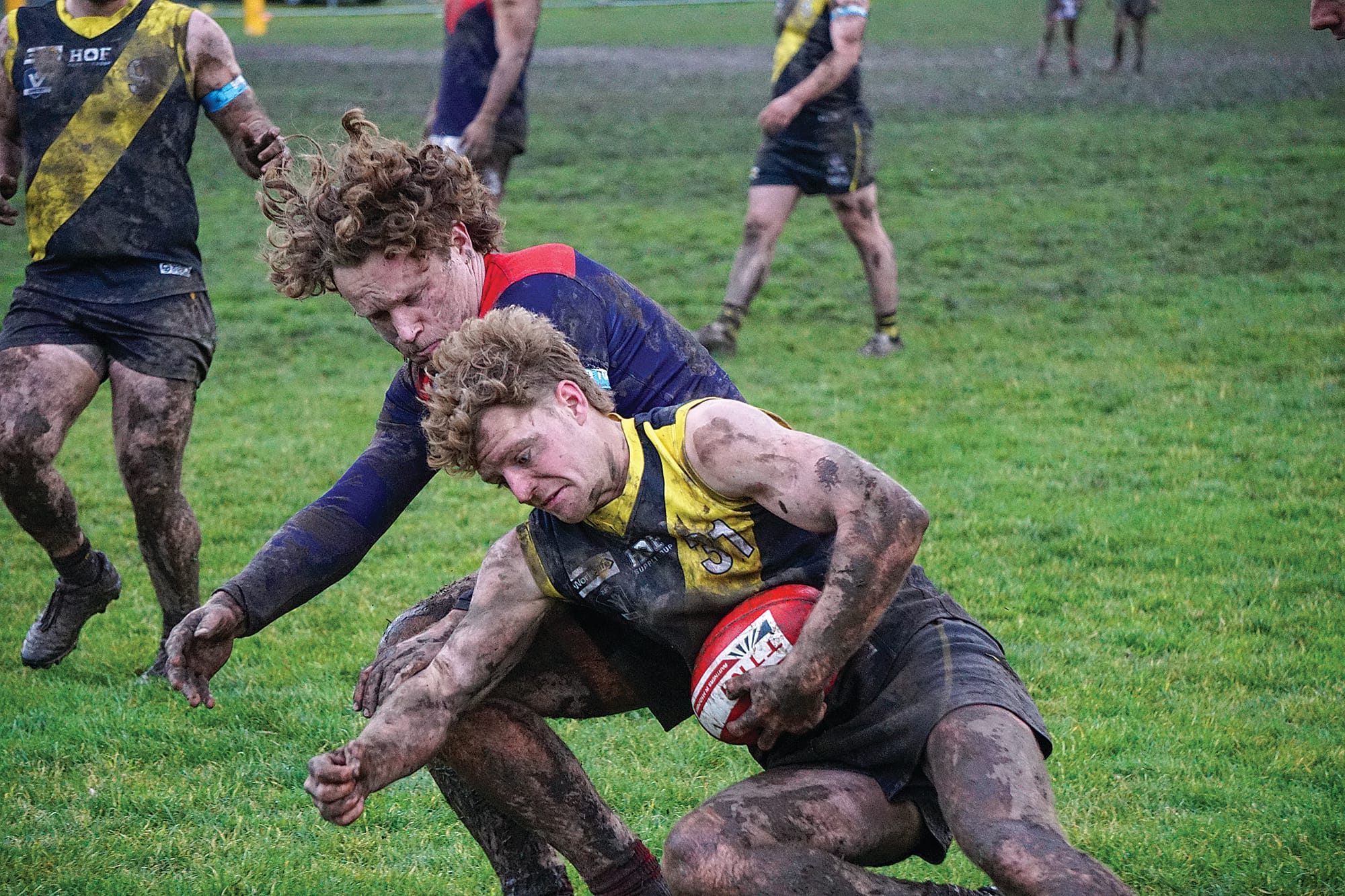 Harrison Mahoney takes possession but is easily taken down. Ns32_3024