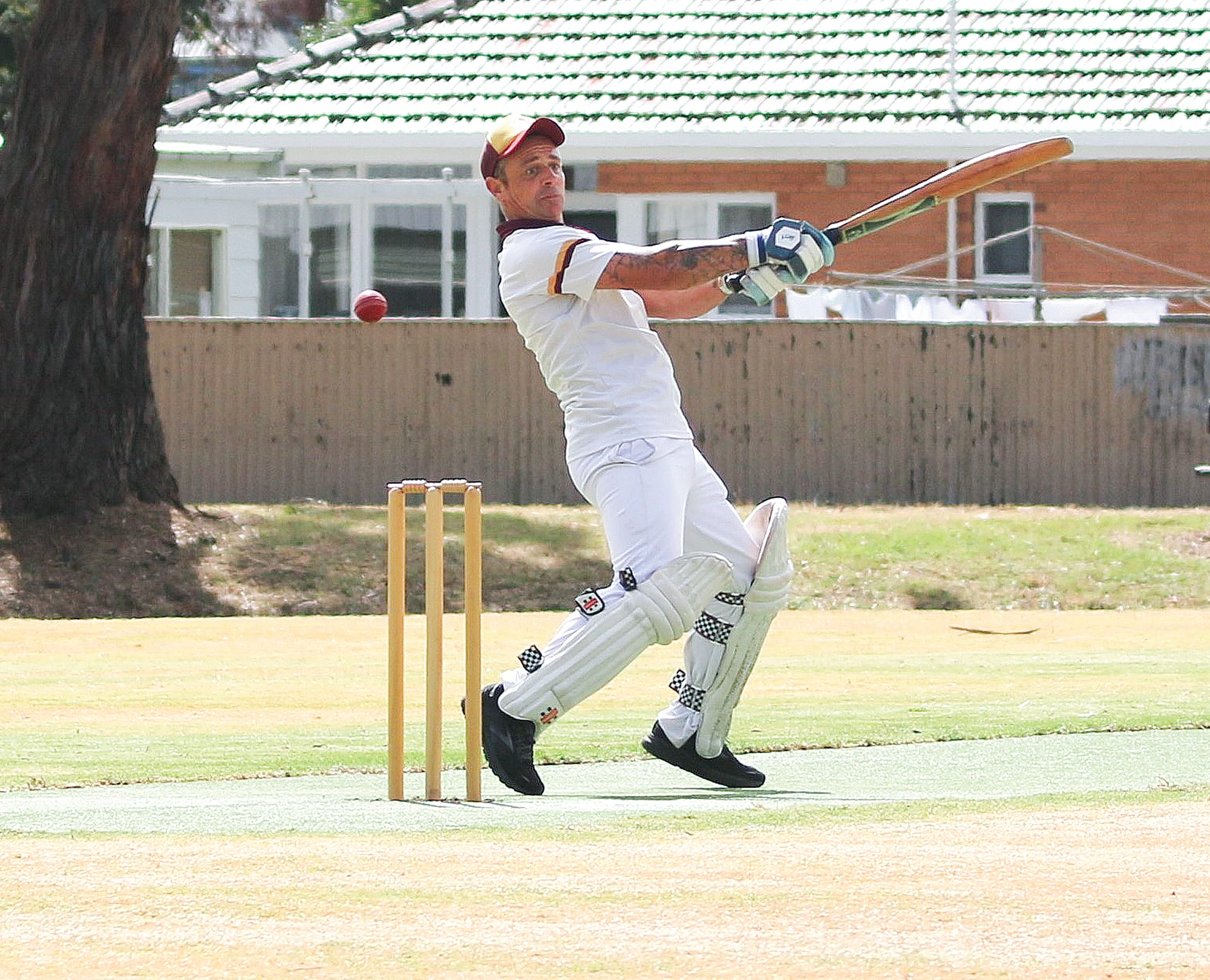 OMK captain Brad Hayes attempts a full-blooded cut but misses. ob52_1324