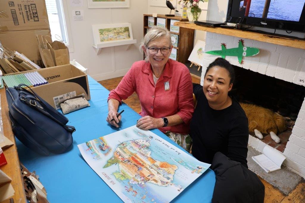 Fish Creek children’s author Alison Lester celebrated the 10th birthday of her bookshop and her own birthday last Sunday, signing books and posters, including this one for Michelle Buckingham.