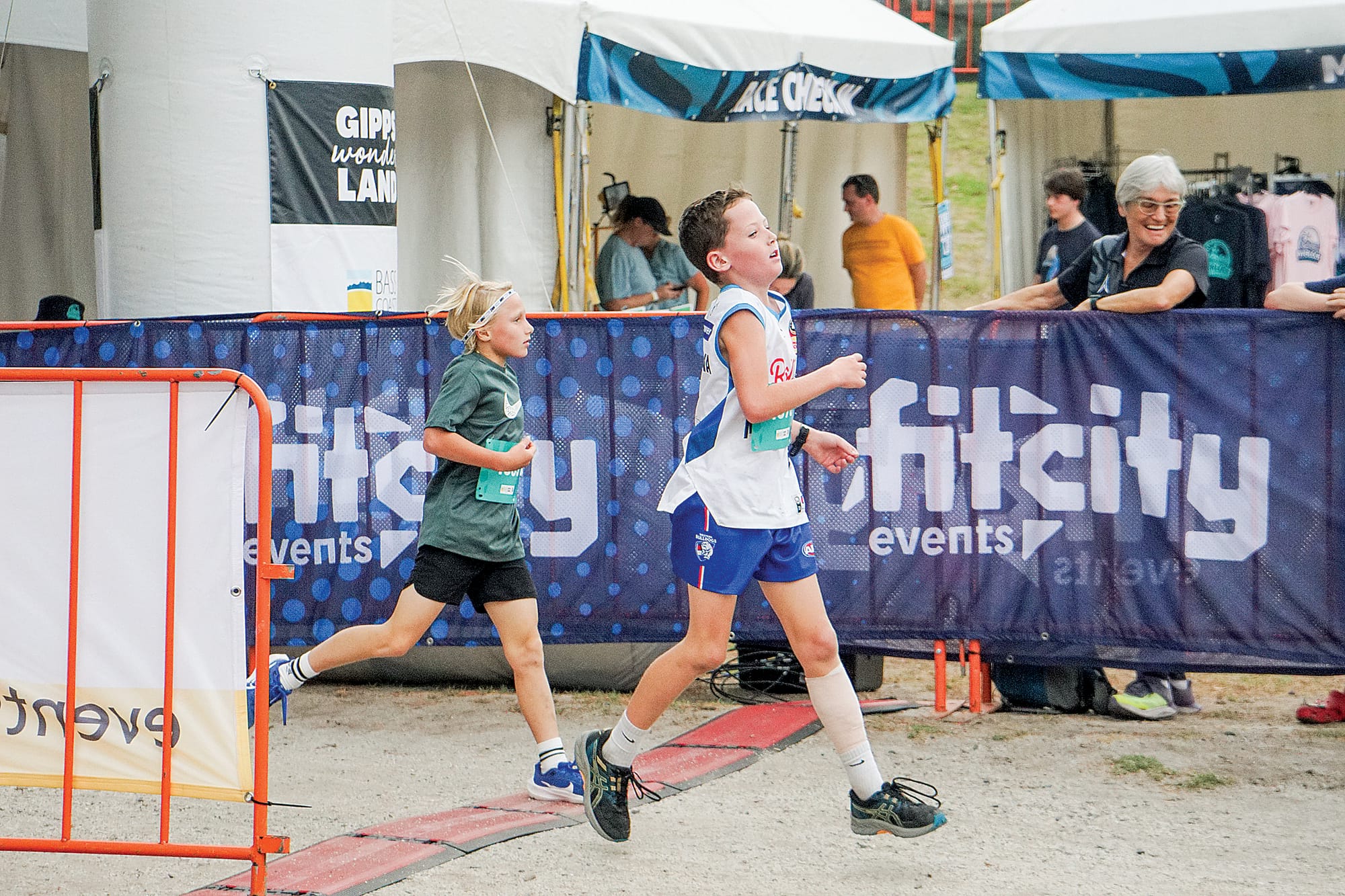 First to finish the two-kilometre run. Ns21_1125