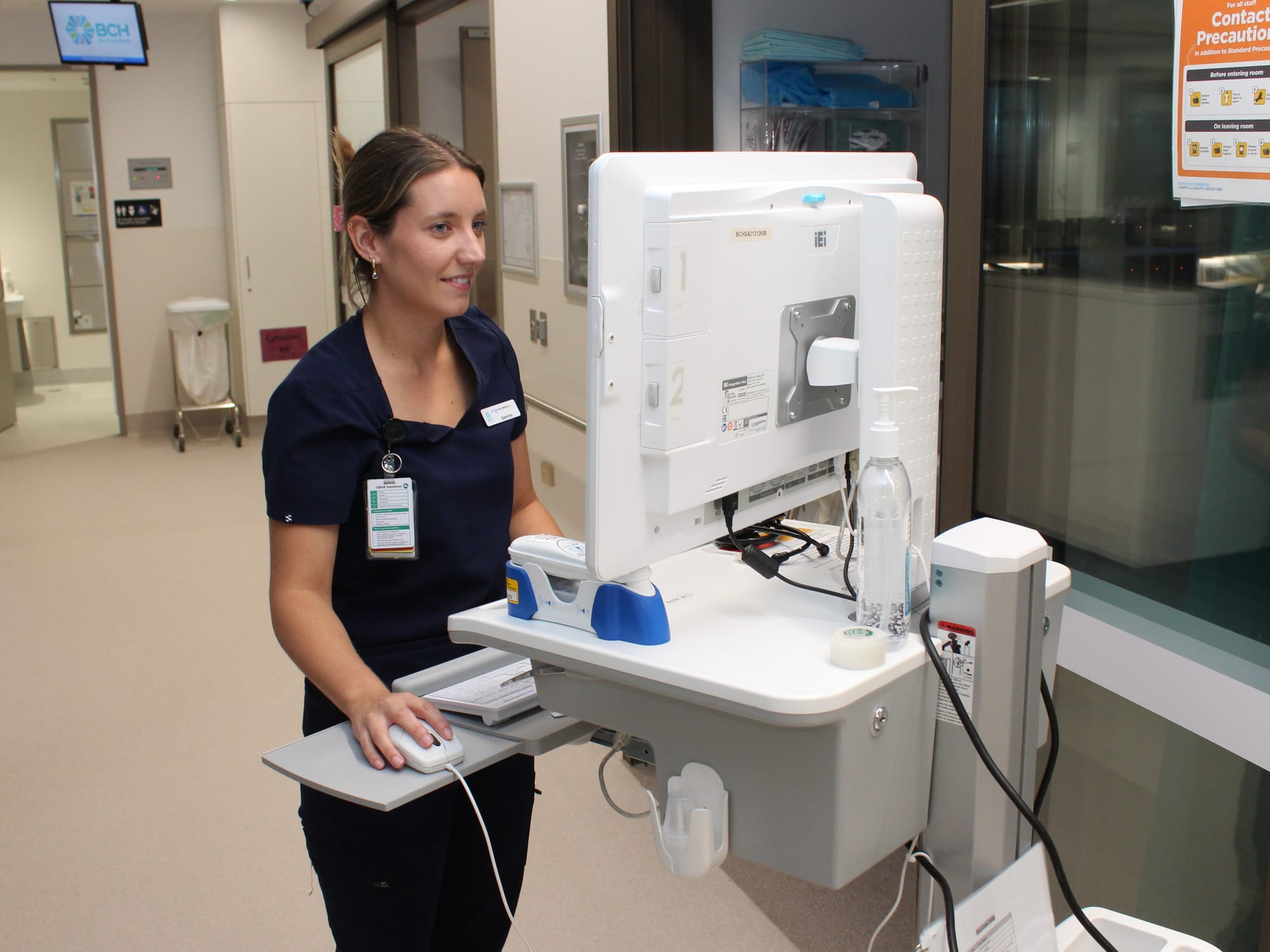 Registered Nurse Gemma Phillips consults information about a patient’s health in the Emergency Department at Wonthaggi Hospital.