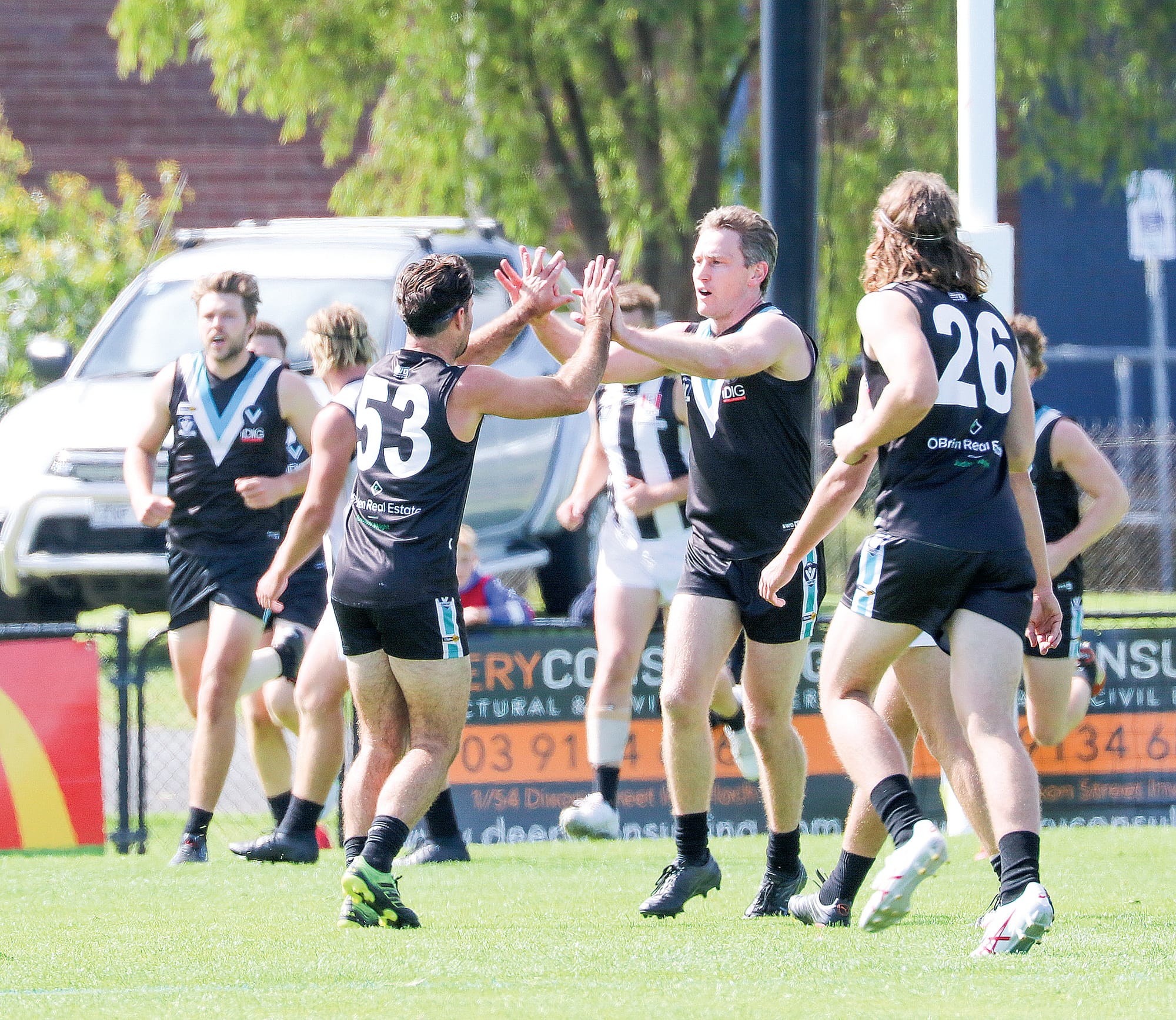 Jack Blair celebrates Wonthaggi’s first goal with Captain Aiden Lindsay at the first match of the season against Sale. Z24_1423