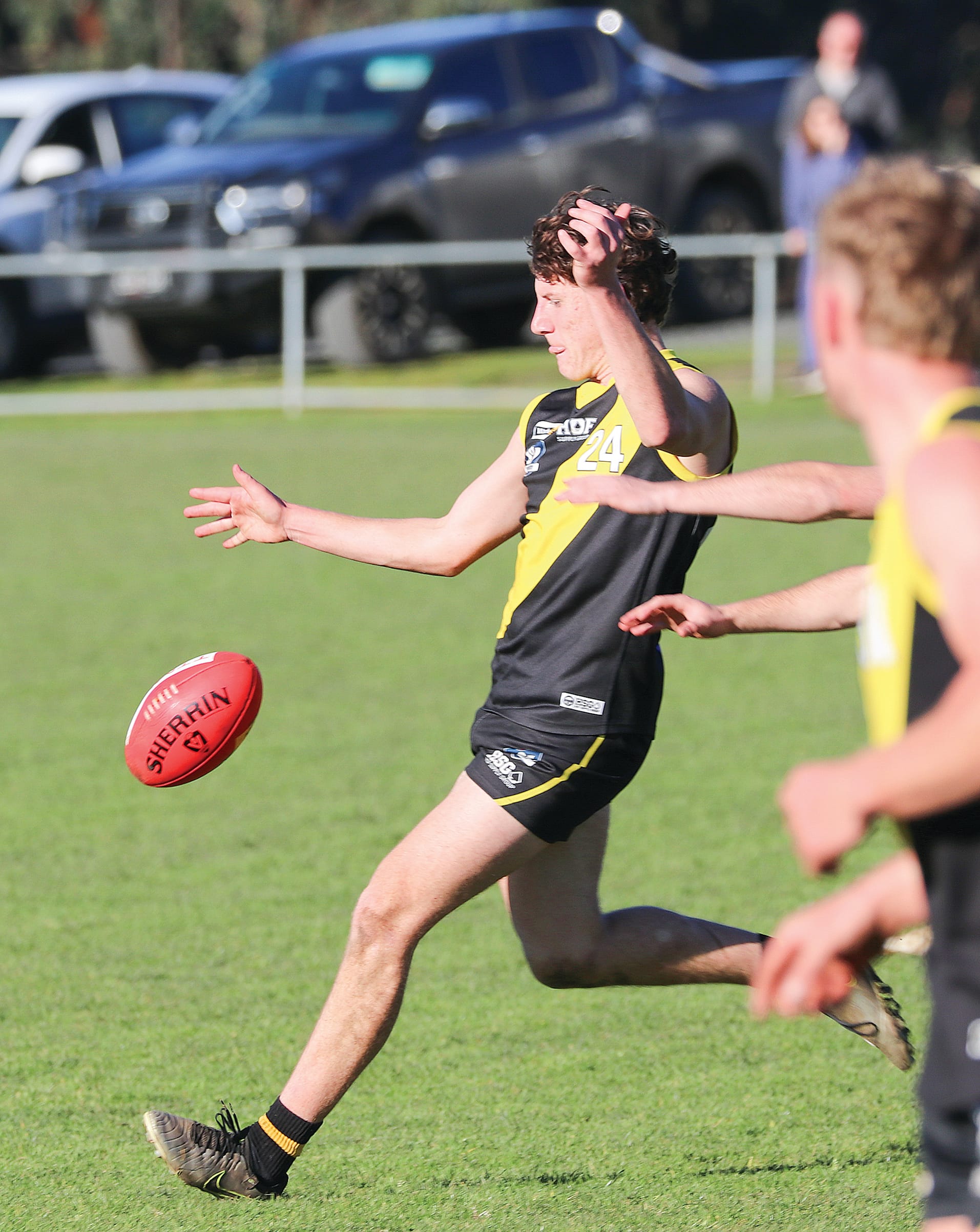 Archie Woodall sends the ball into Mirboo North’s forward 50. W28_3225