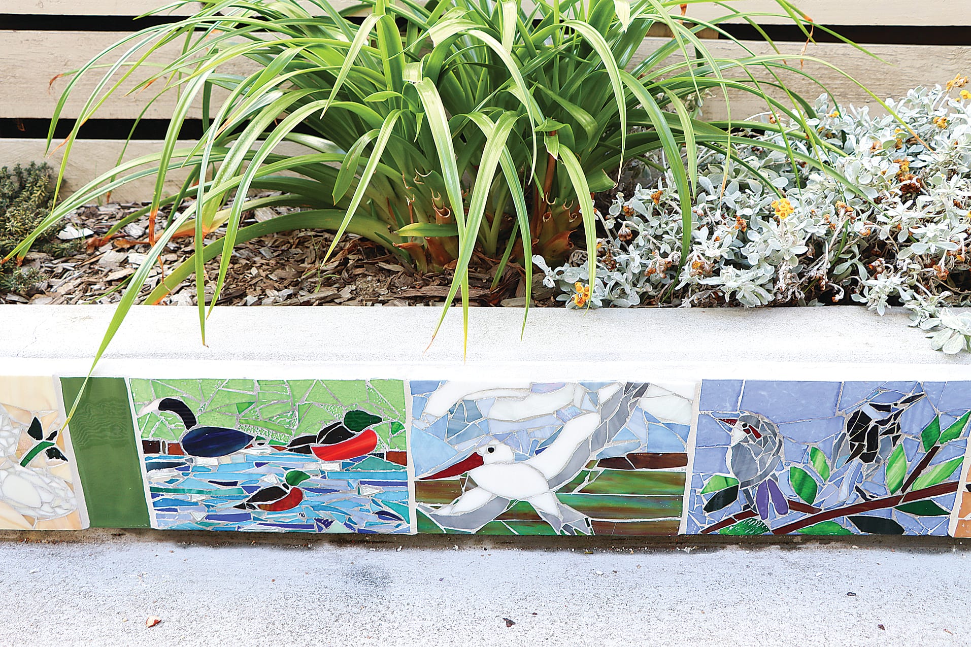 Nature features prominently in Fish Creek’s recently unveiled mosaic works.