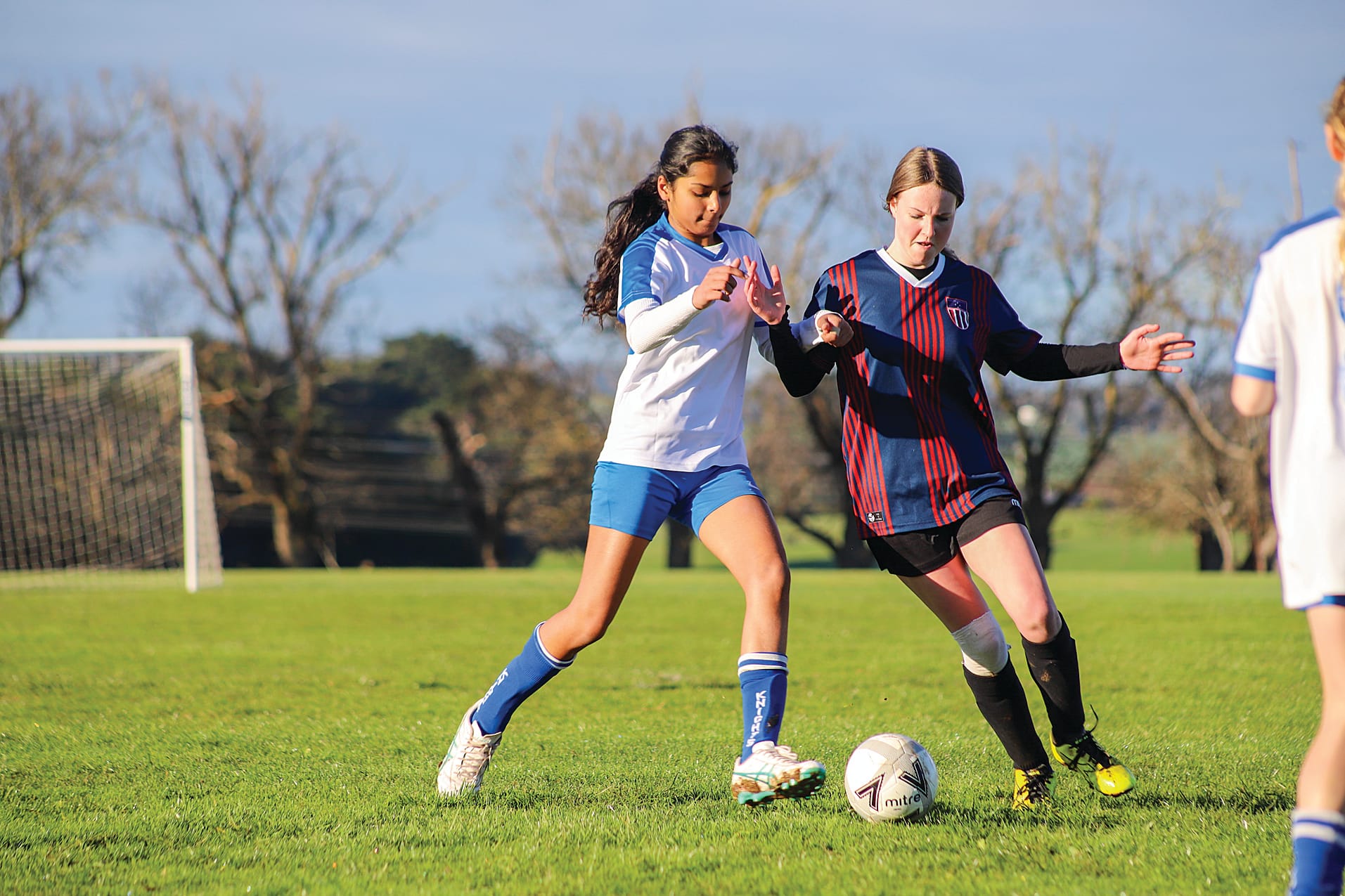 Leongatha Knights Jazvin Dhillon battles with Korumburra’s Grace Goodwin for possession of the ball.
