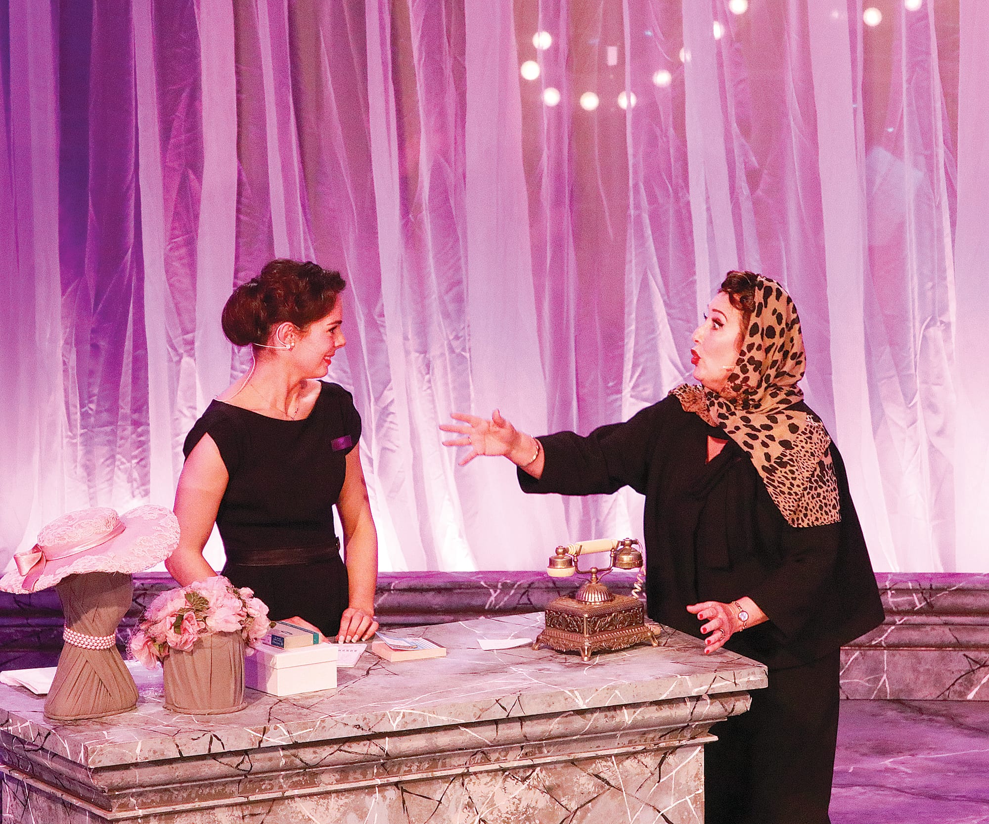 Fay and Goodes model Ella Osborne in act one with Magda played by Rhonda Melhuish at the ‘Ladies in Black’ opening night. Z34_4622 