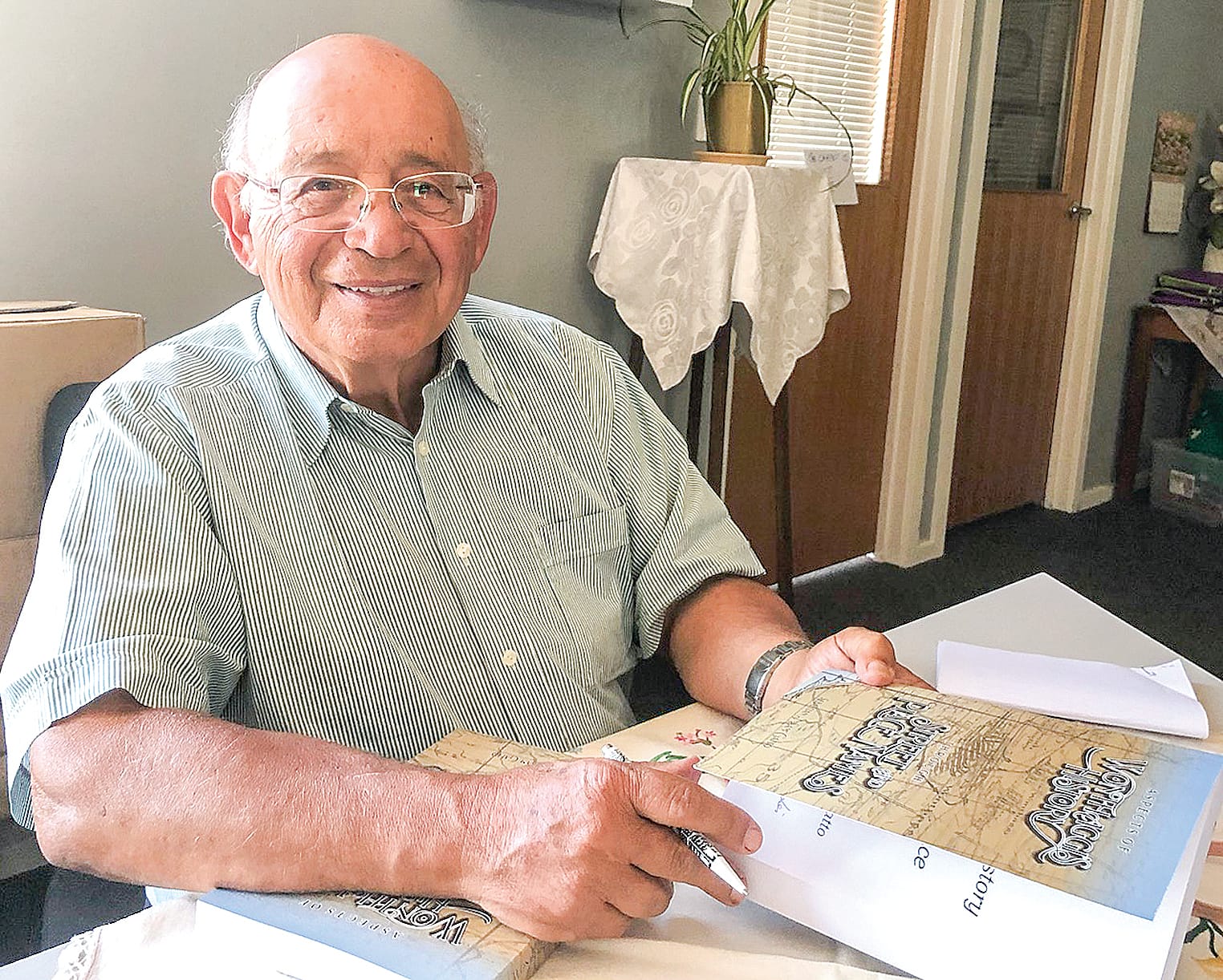 Sam Gatto researchers the mining town’s story behind the signs