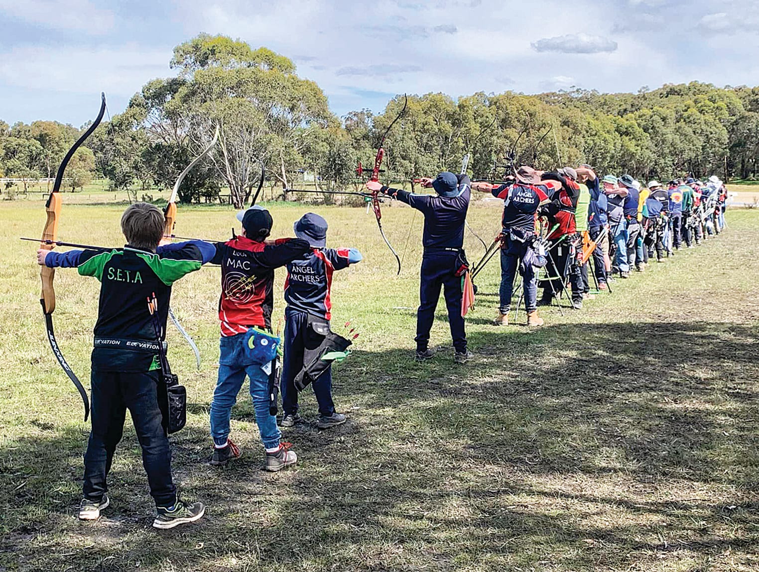 The field lined up to shoot at the State Championships in Balnarring.