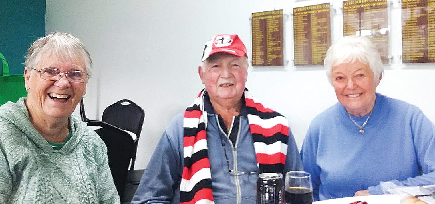 Liz alongside the prize winner for the best dressed footy supporter, ‘Pud’ the St Kilda supporter and his wife Yvonne at the 2019 Big Lunch.