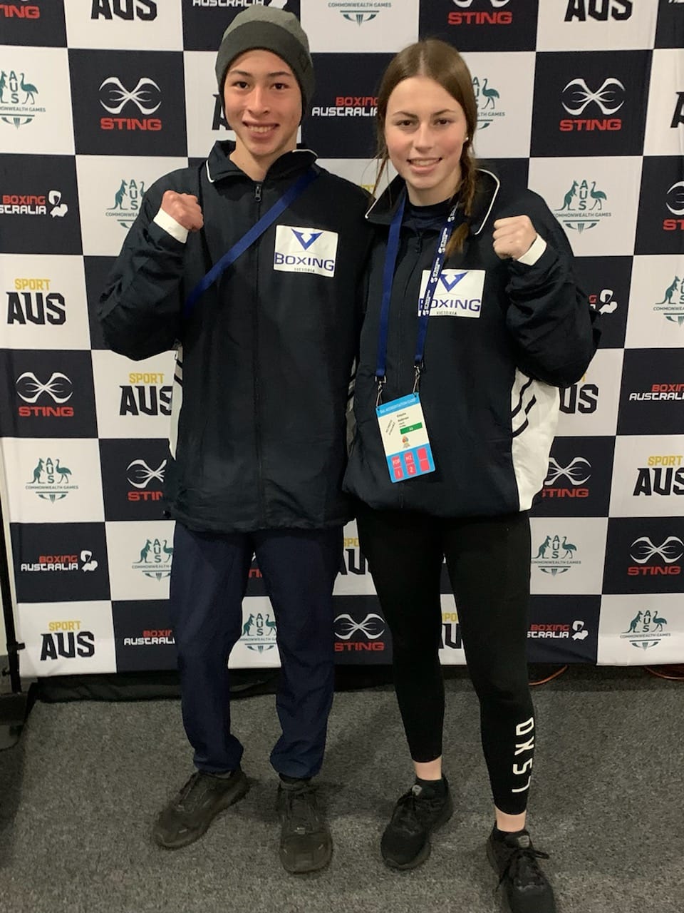 Corner Inlet Boxing club duo Kinesha Anderson and Sebastian Saulwick in their team Victoria gear at the Australian National Titles. 