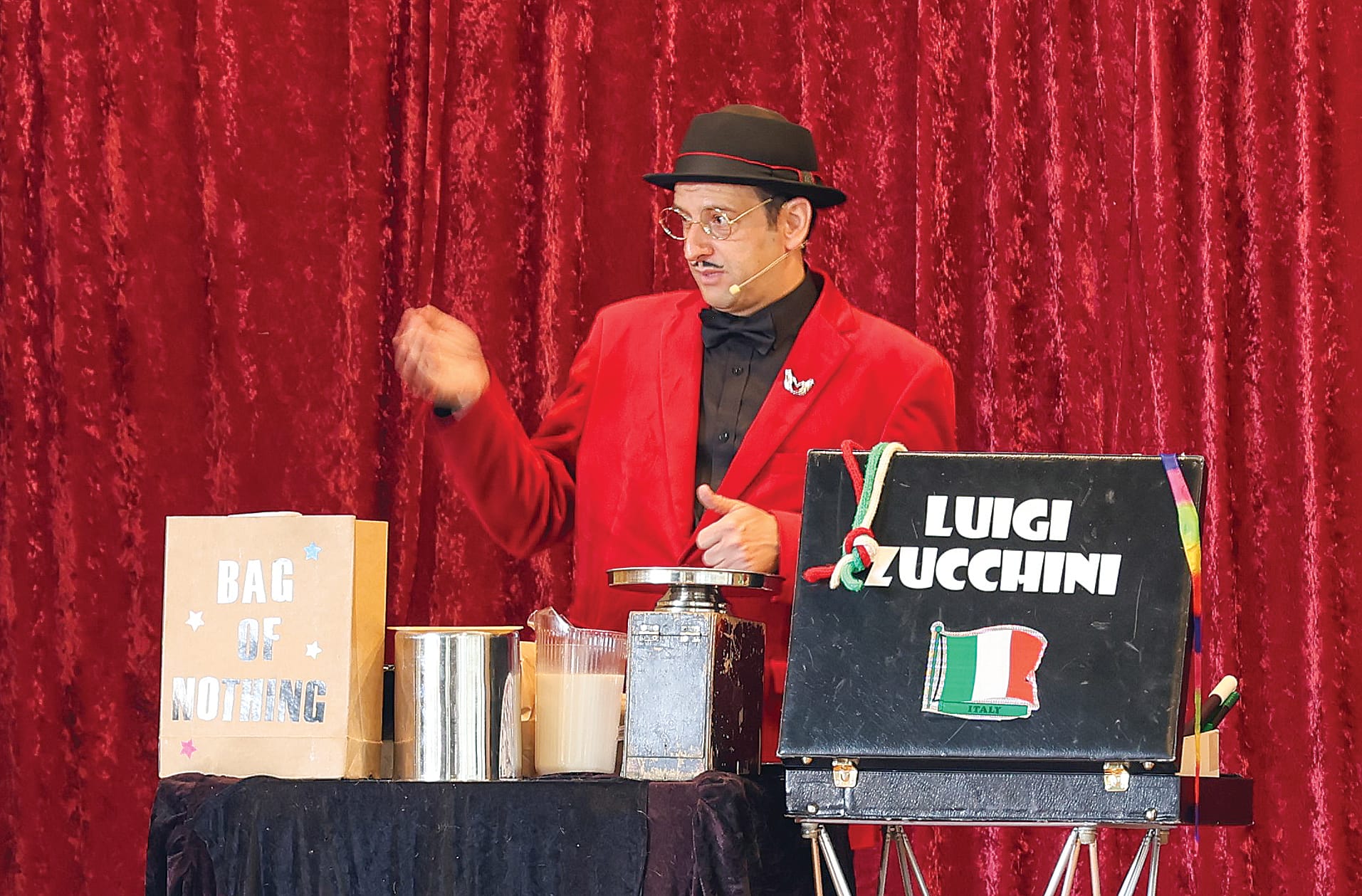 Magician Luigi Zucchini keeps the crowd entertained in the Fish Creek Hall during the Fishy Stories Festival.