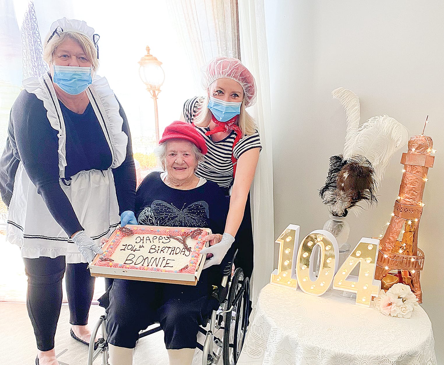 Bonnie Castle with Griffiths Point Lodge’s Lifestyle Team members Donna Dalton and Natasha Stapleton, who helped bring a taste of Paris to Bonnie for her 104th birthday celebration.
