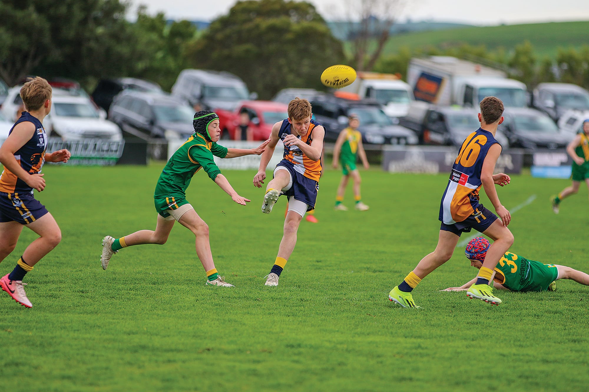 Inverloch-Kongwak’s Franklin Boyd-Munro kicks the ball to teammate Liam Jones in the U12 mixed grand final.