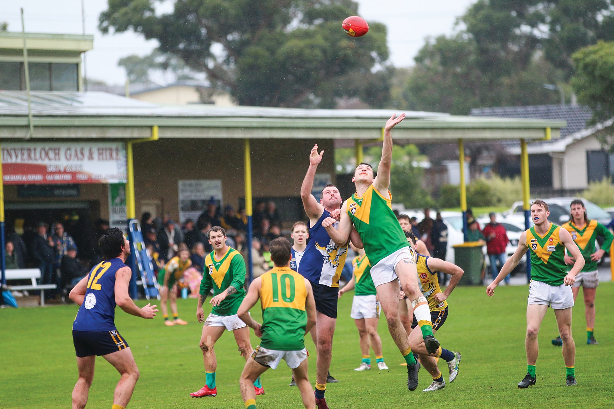 Inverloch-Kongwak’s Campbell Scott reaches to get hands on the ball. 