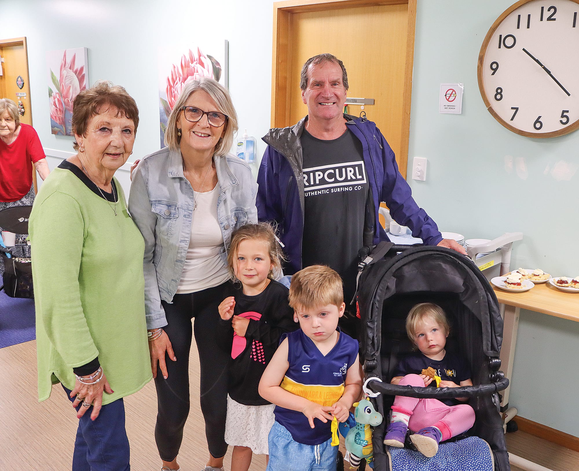 Woorayl Lodge Auxiliary president Kaye Warren and Sue and Sam Dowd, with Alice, Harry and Maya enjoy the fete. A26_4924