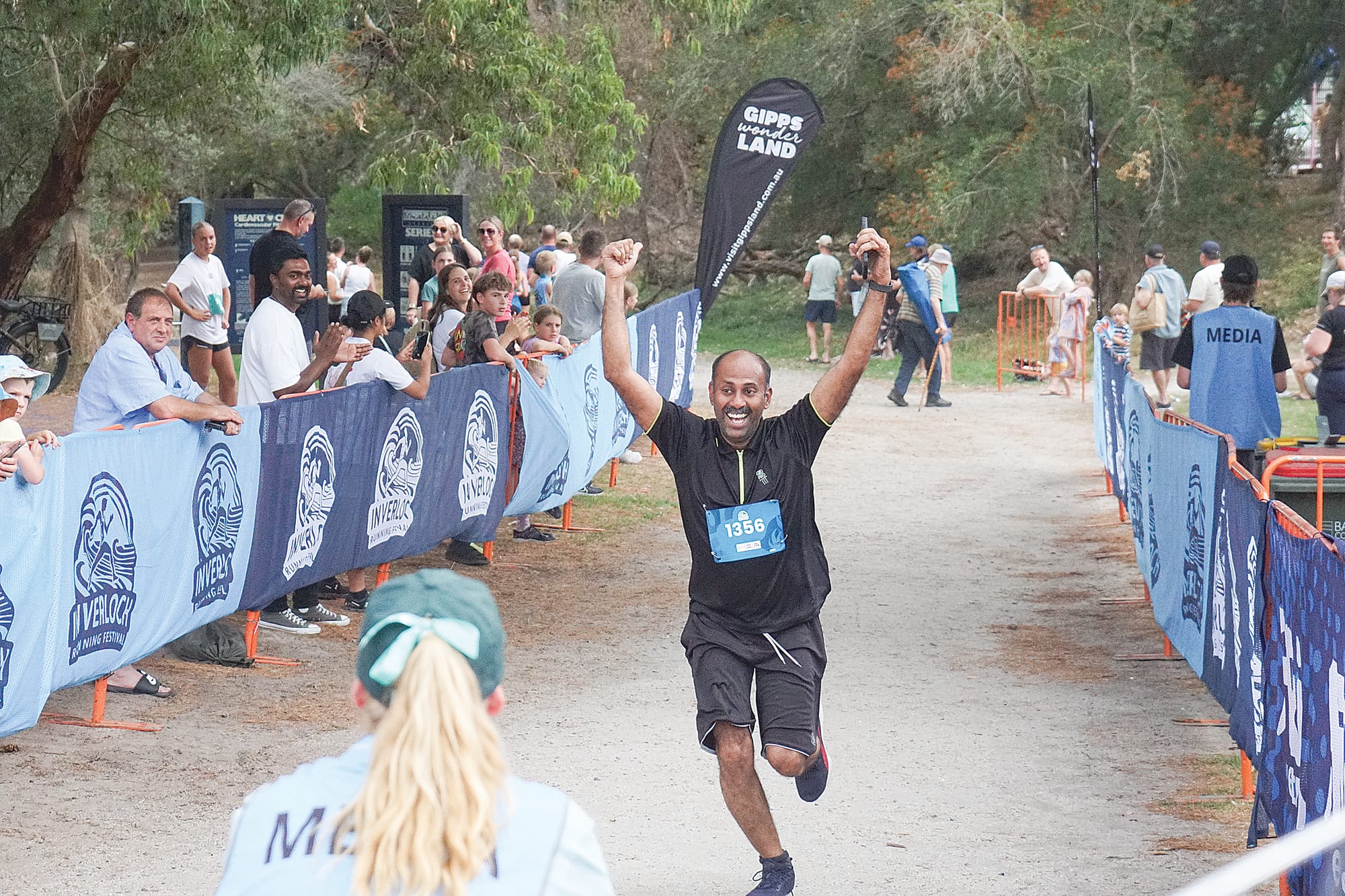 Finishing the gruelling five-kilometre run with a smile. Ns22_1125