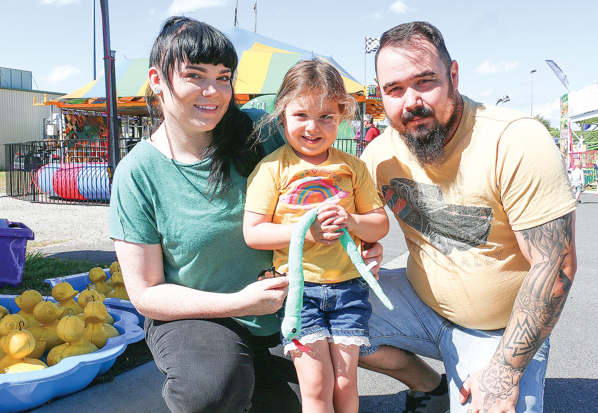 Korumburra’s Ellie Priestley, and Erica and Terry Green won a prize playing the carnival games at the Korumburra Show.