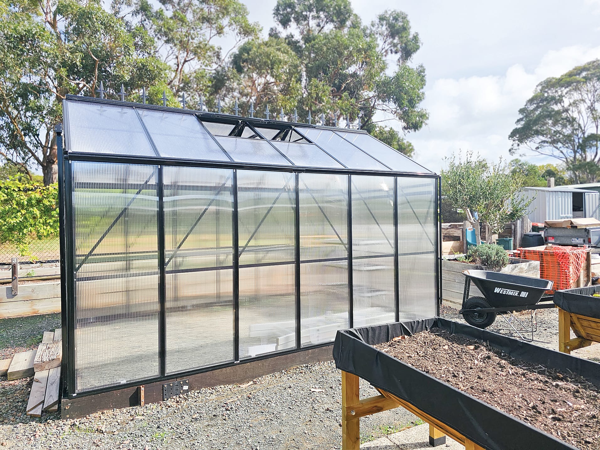 The new glasshouse at PICAL’s community garden is now complete.