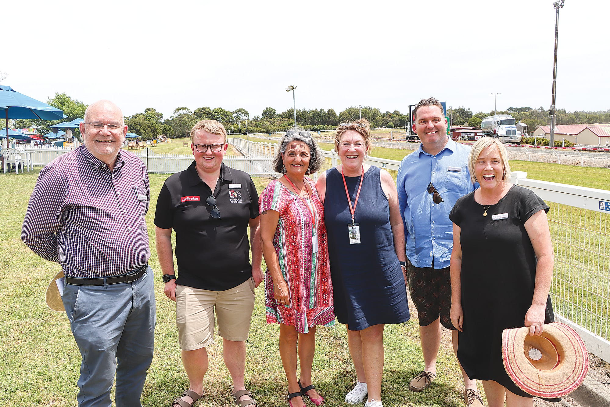 Stony Creek Racing Club Committee Members Stephen Bradford, Jye Davey, Tony Cantwell and Sarah Bourke (right) join Go Girls Rita Bromley and CEO Michelle Dobson at Saturday’s Evans Petroleum Race Day. A67_0125