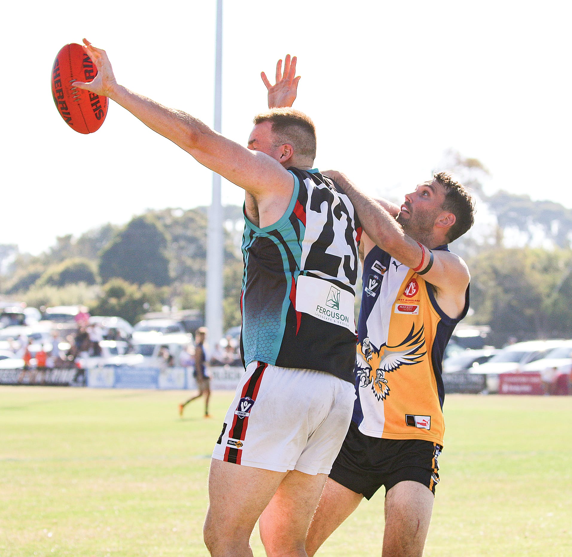 Dylan Clark battles for the ball will Cora Lynn’s William Thomas