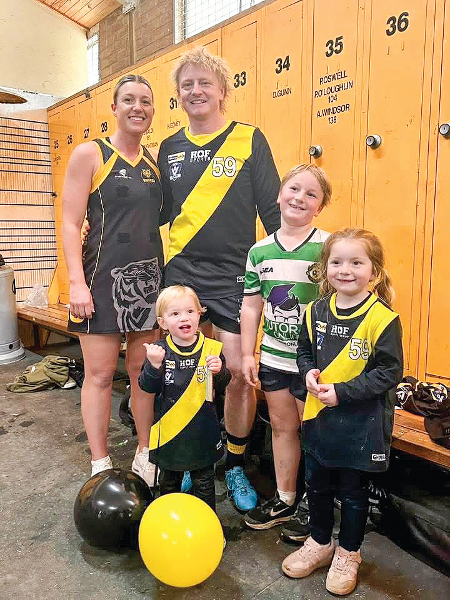 Josh Taylor celebrates his 250 game milestone with wife Emily and kids Jax, Blaze and Nash.
