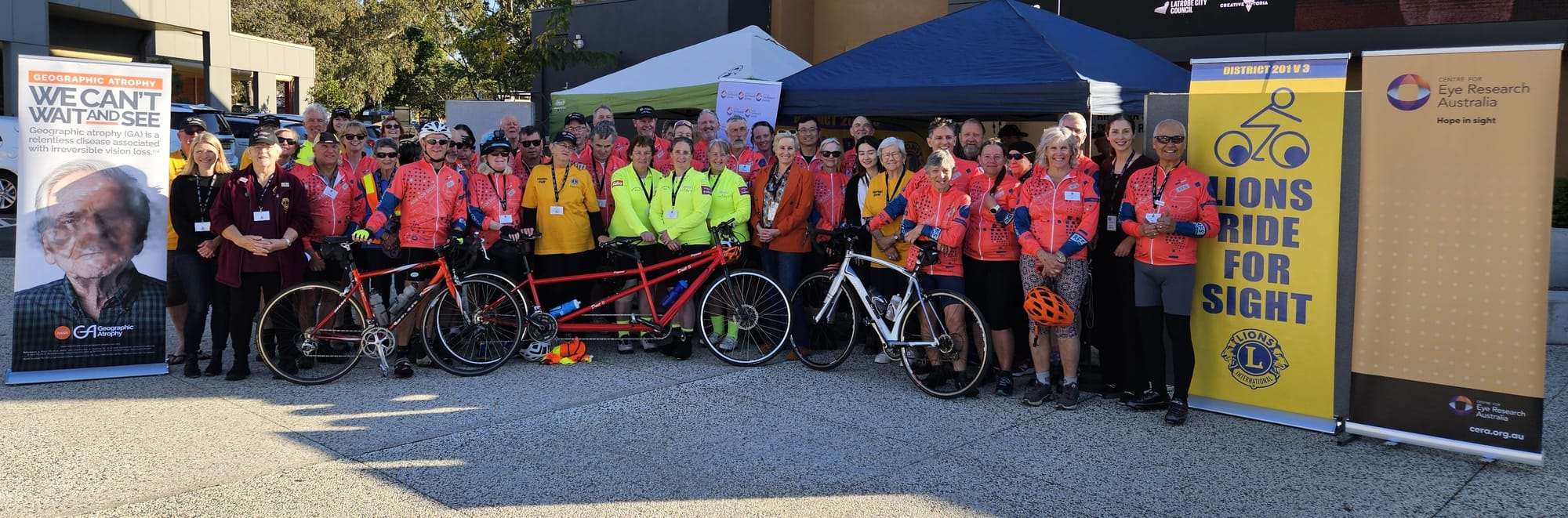 Riders and support group with sponsors and The Centre of Eye Research Australia (CERA) representatives.