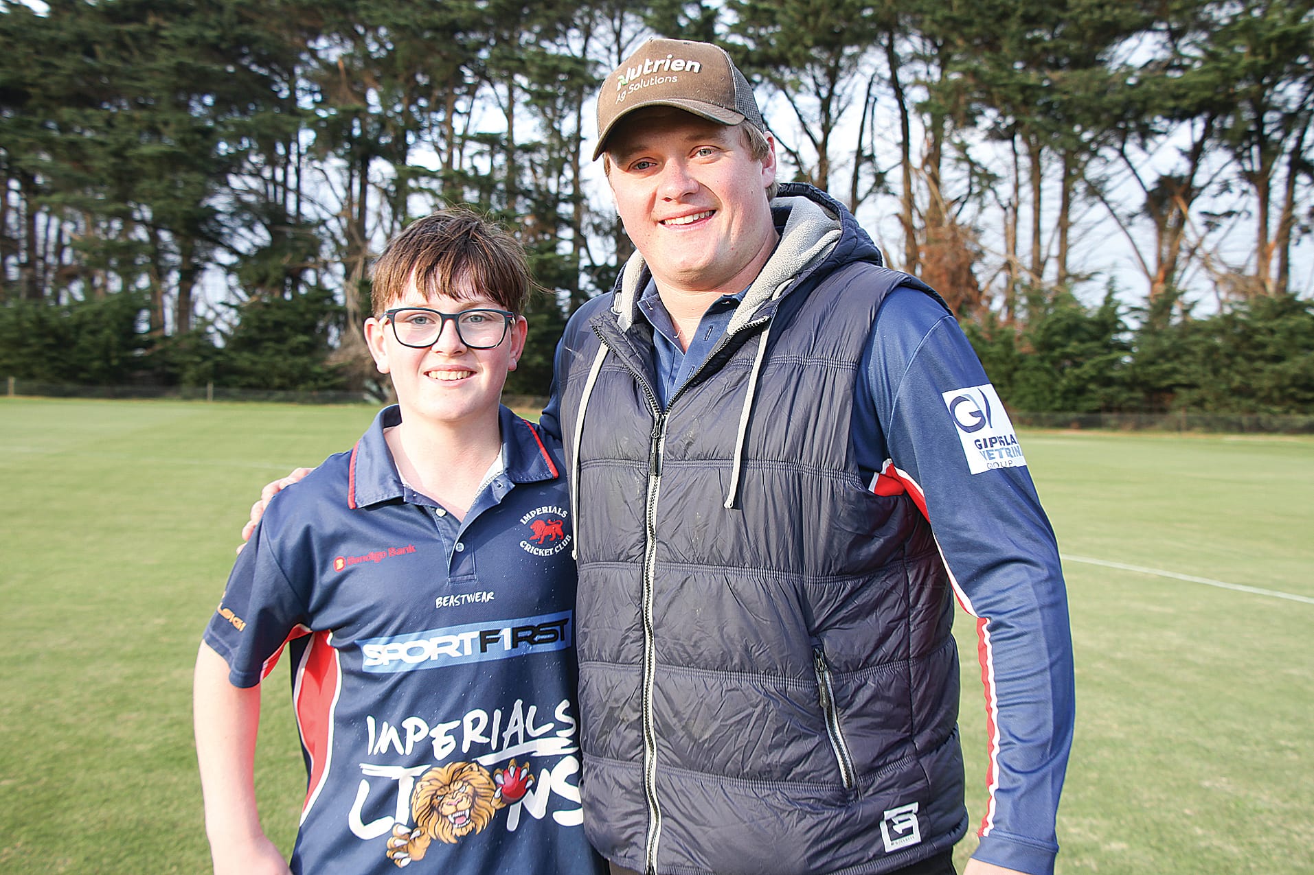 U15 Oliver Dunlop with Imperials co-captain and junior coach Jack Ginnane. B12_4024
