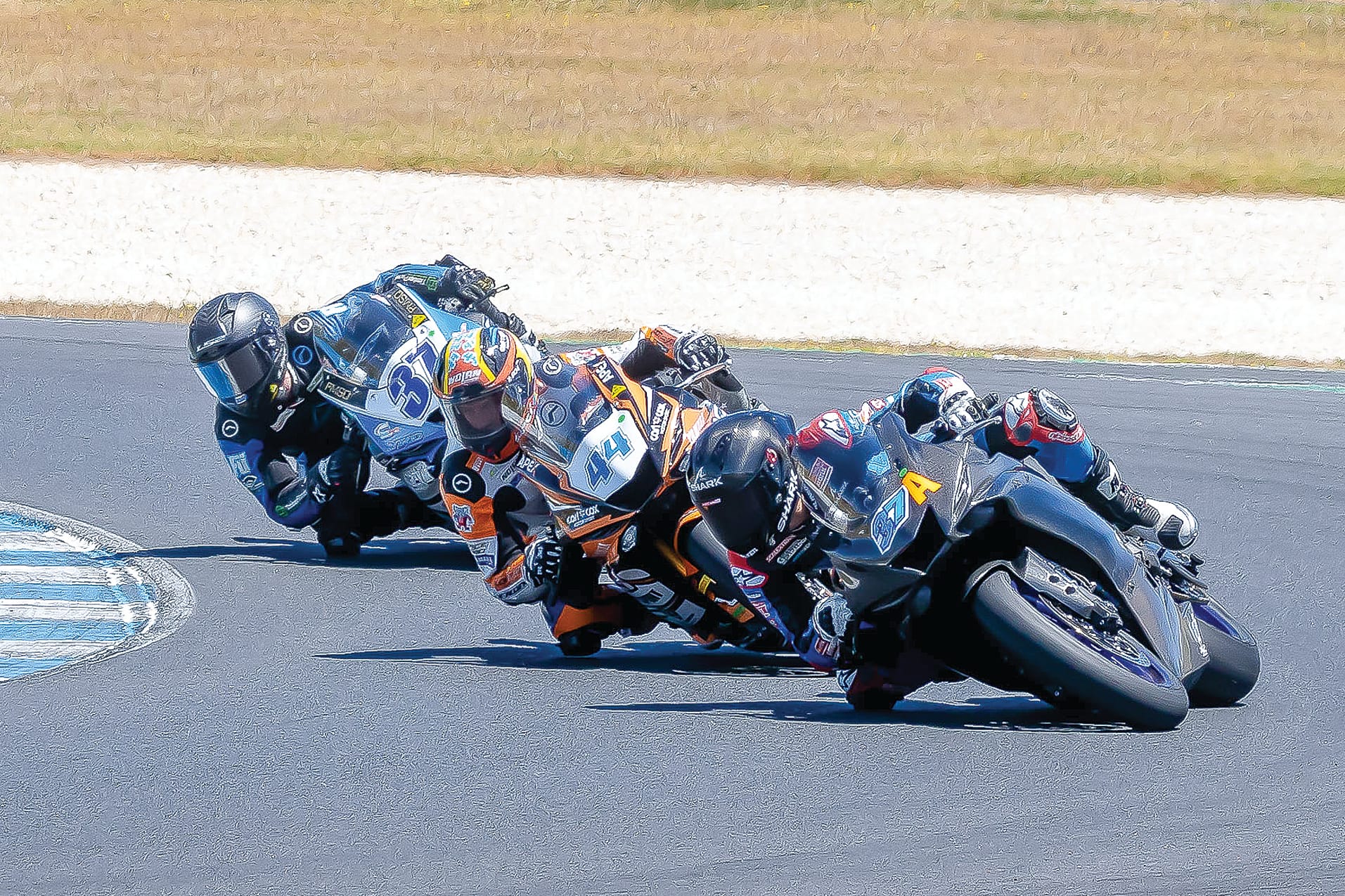 Marianos Nikolis (37A) leads Tom Bramich (44) and Jack Mahaffy through turn 4. A great weekend for Marianos claiming two victories and two seconds plus a lap record.